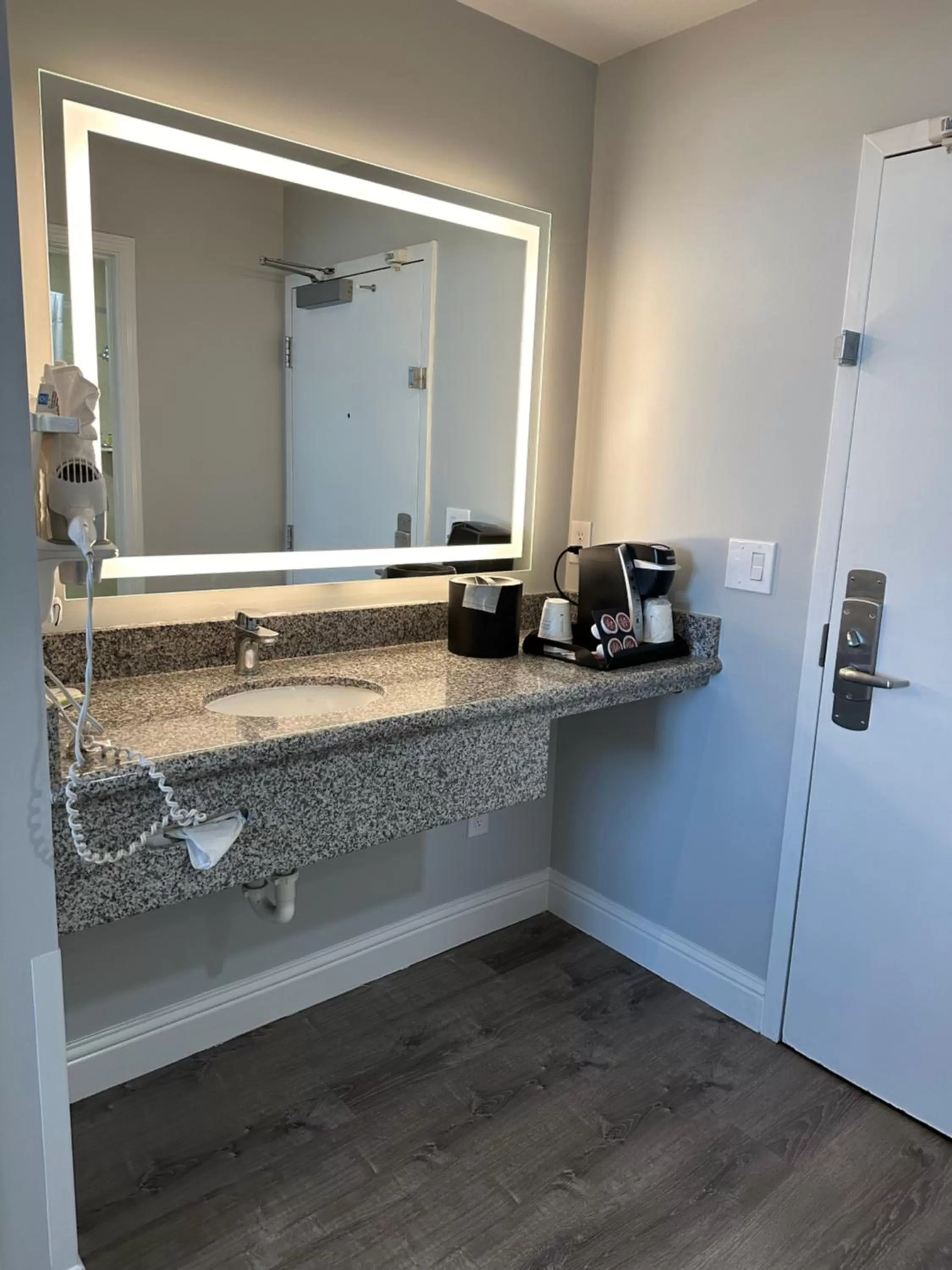 Bathroom in Super 8 by Wyndham San Bruno /SF Intl Arpt West