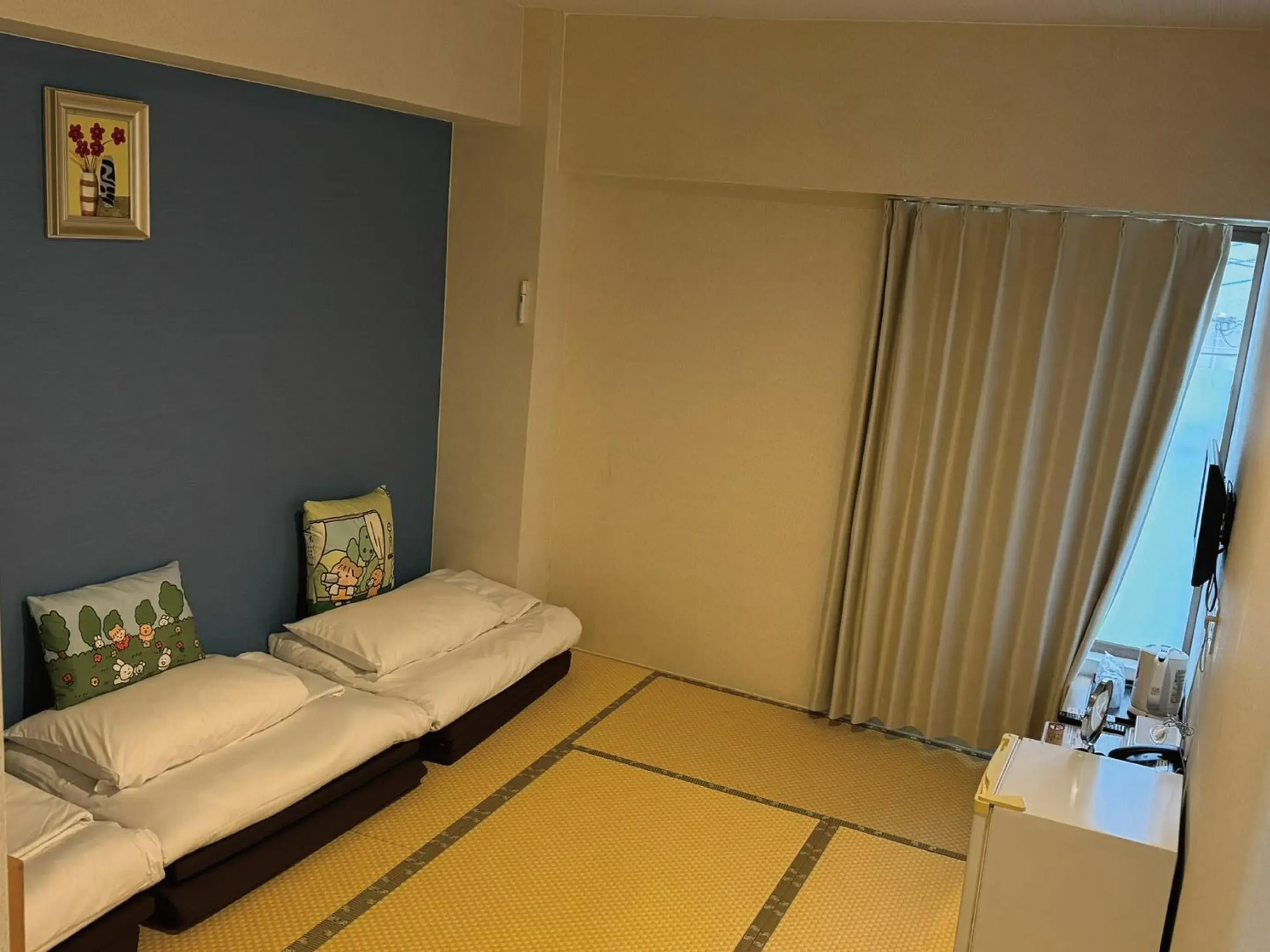 Photo of the whole room, Bed in Victoria Hotel Naha
