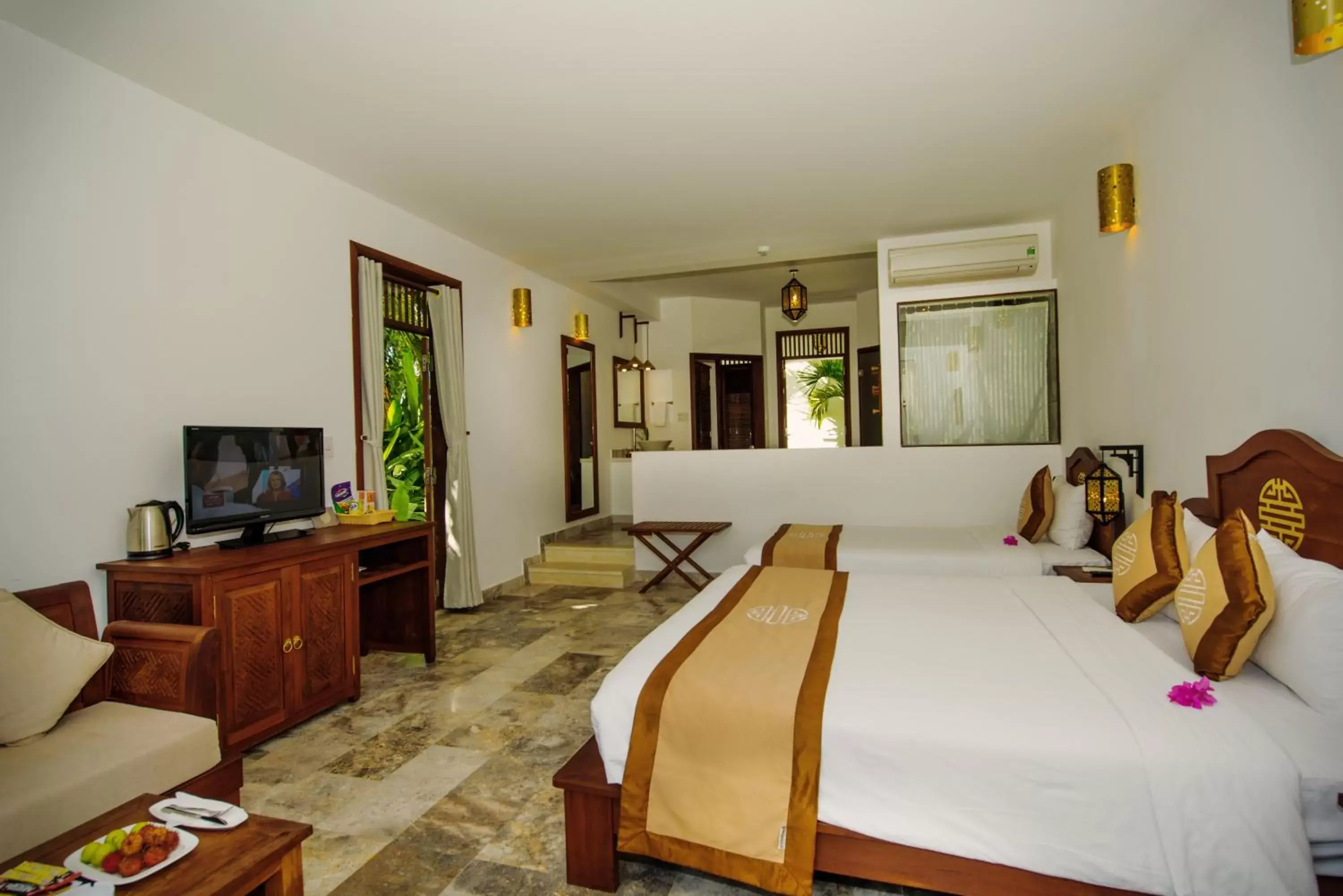 Bedroom, TV/Entertainment Center in Legacy Hoi An Resort - formerly Ancient House Village Resort & Spa