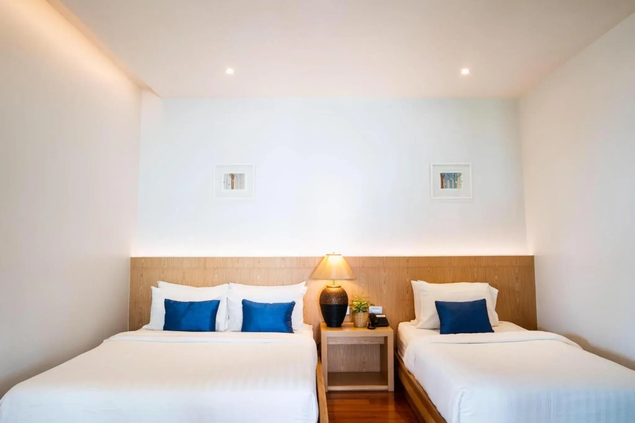 Photo of the whole room, Bed in Coral Cliff Beach Resort Samui - SHA Plus