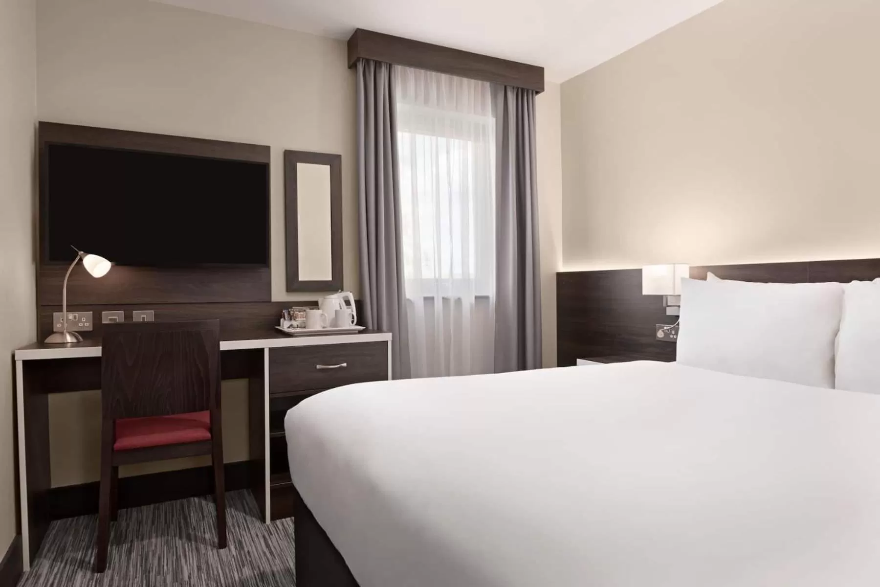 Bed in Ramada by Wyndham Cobham