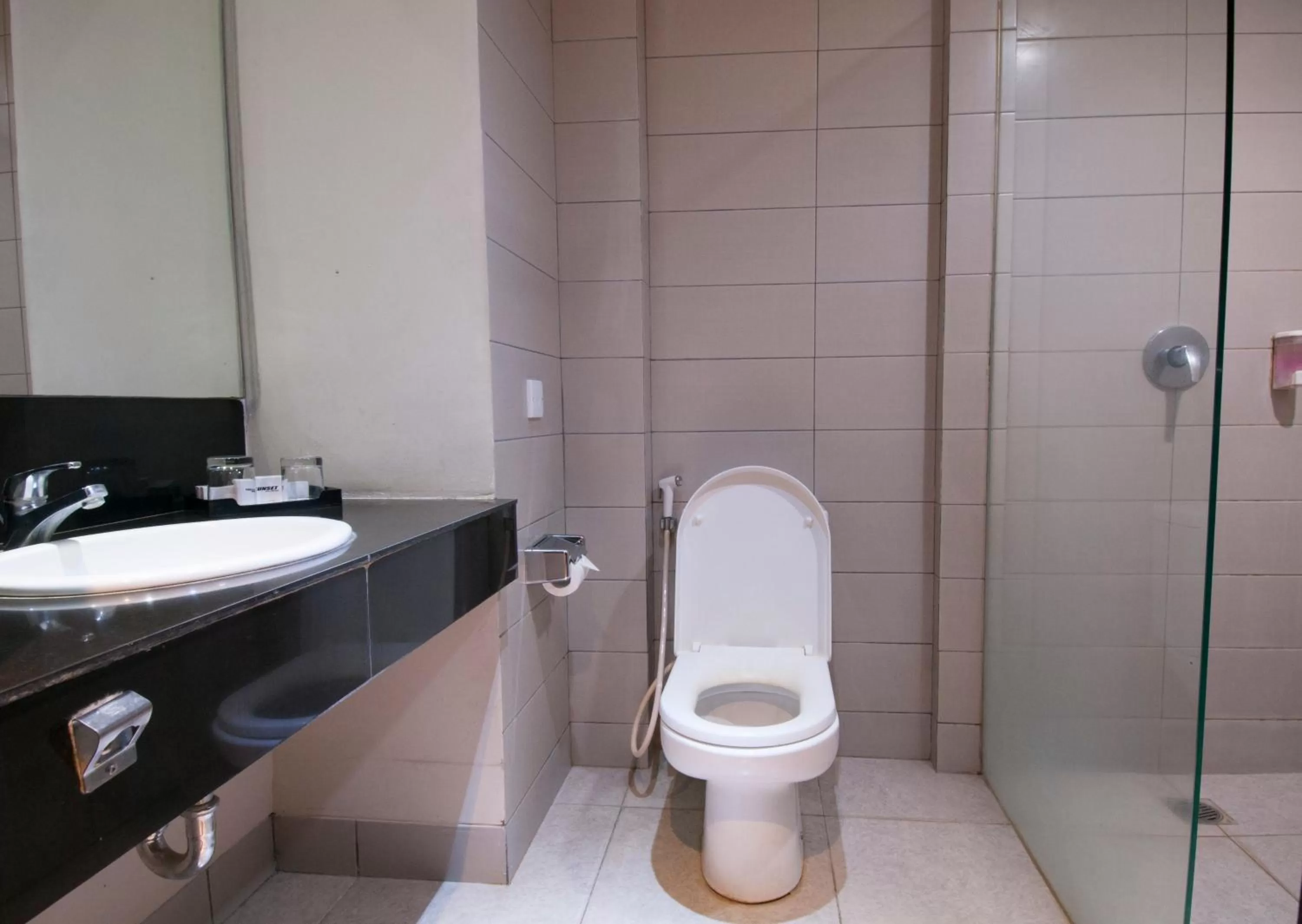 Bathroom in 100 Sunset Kuta Hotel & Ballroom