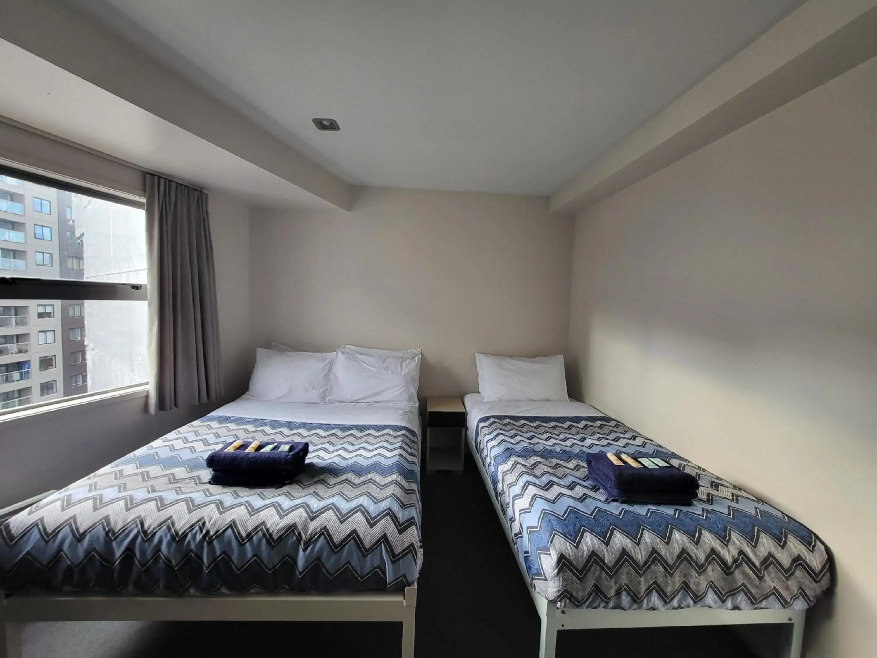 Bed in Empire Apartments Bed in Empire Apartments