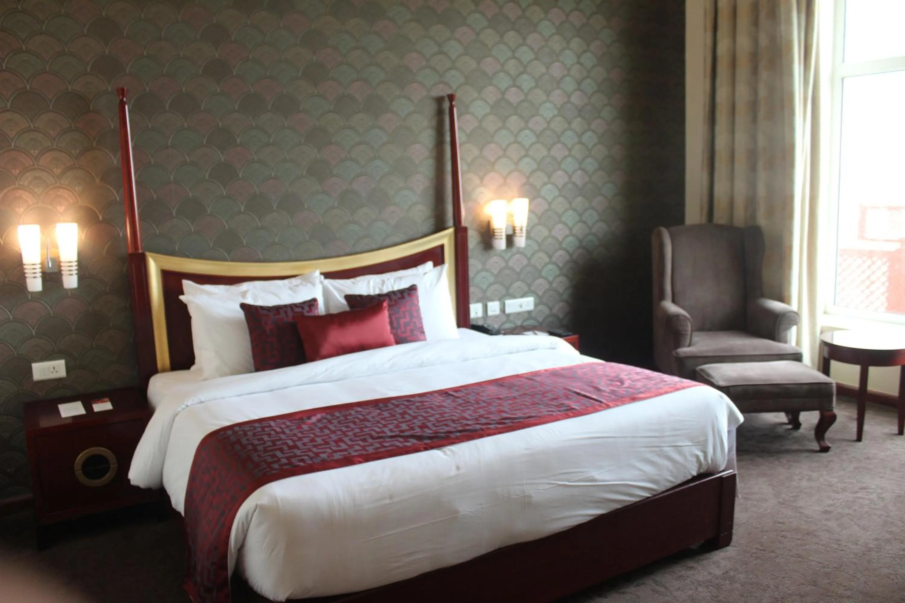 Bed in Ramada by Wyndham Jaipur Jaisinghpura