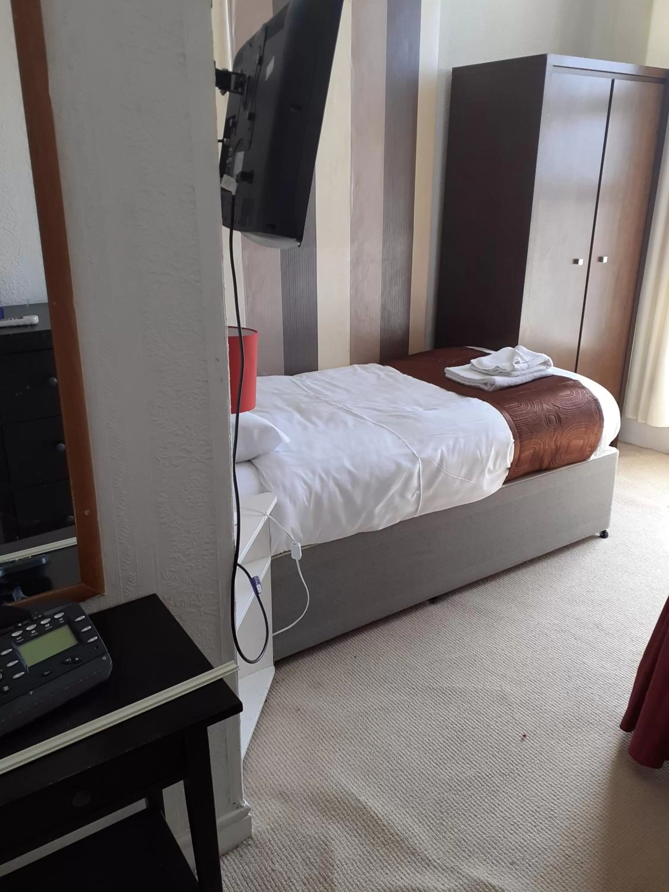 Bed in The Coastal Bay Hotel