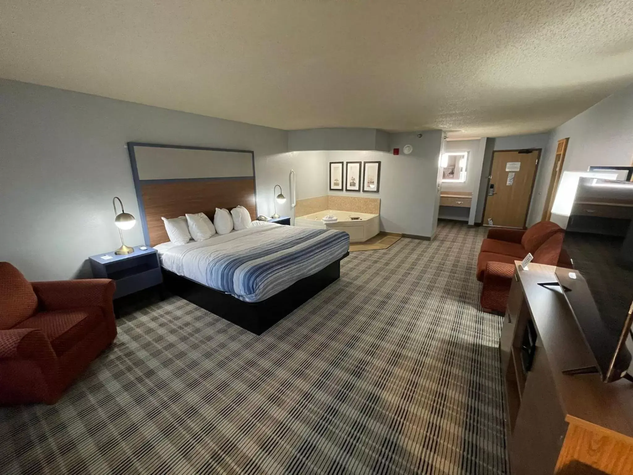 Photo of the whole room, Bed in AmericInn by Wyndham Sayre