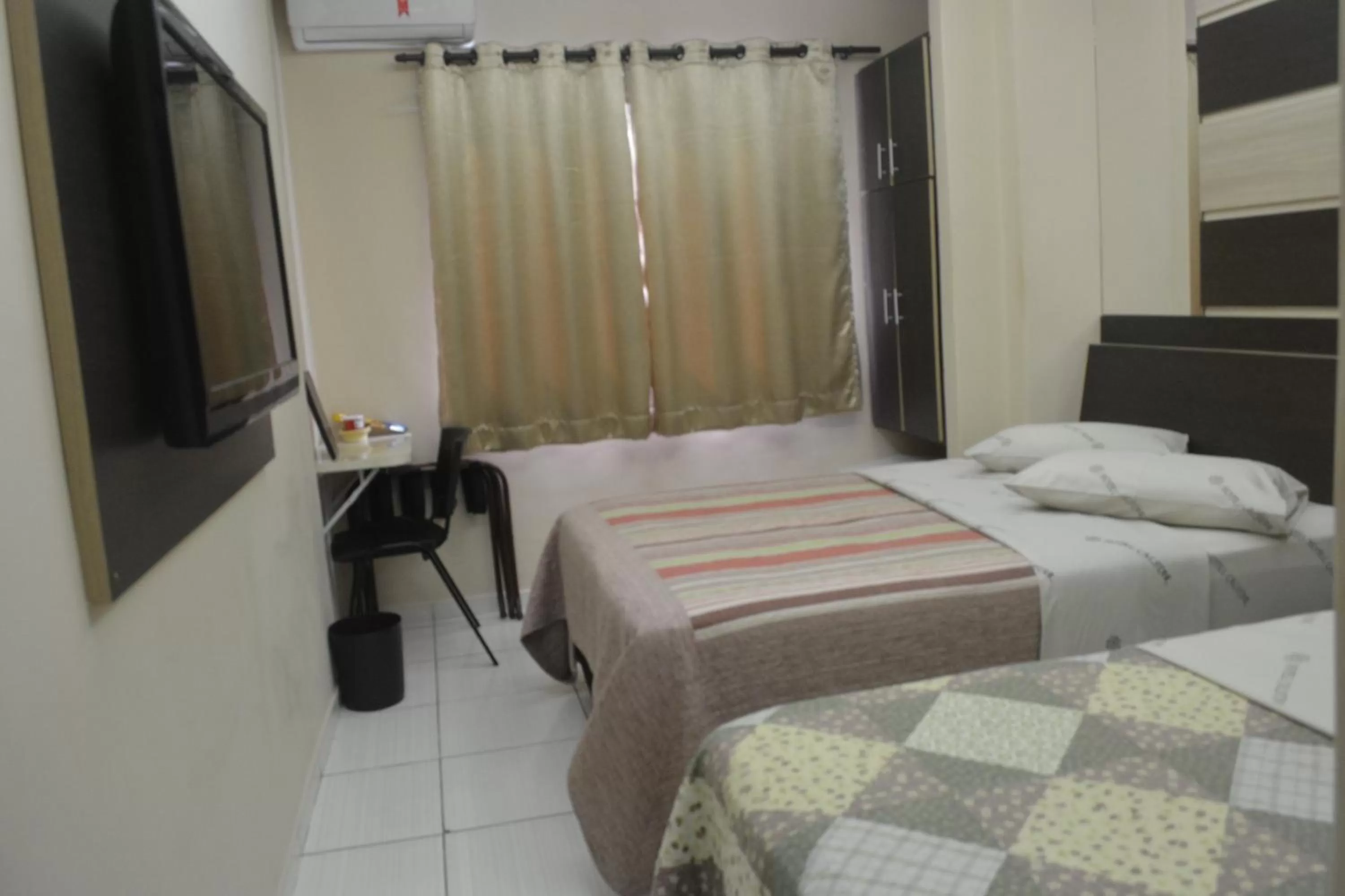 Bed in Hotel Calstar