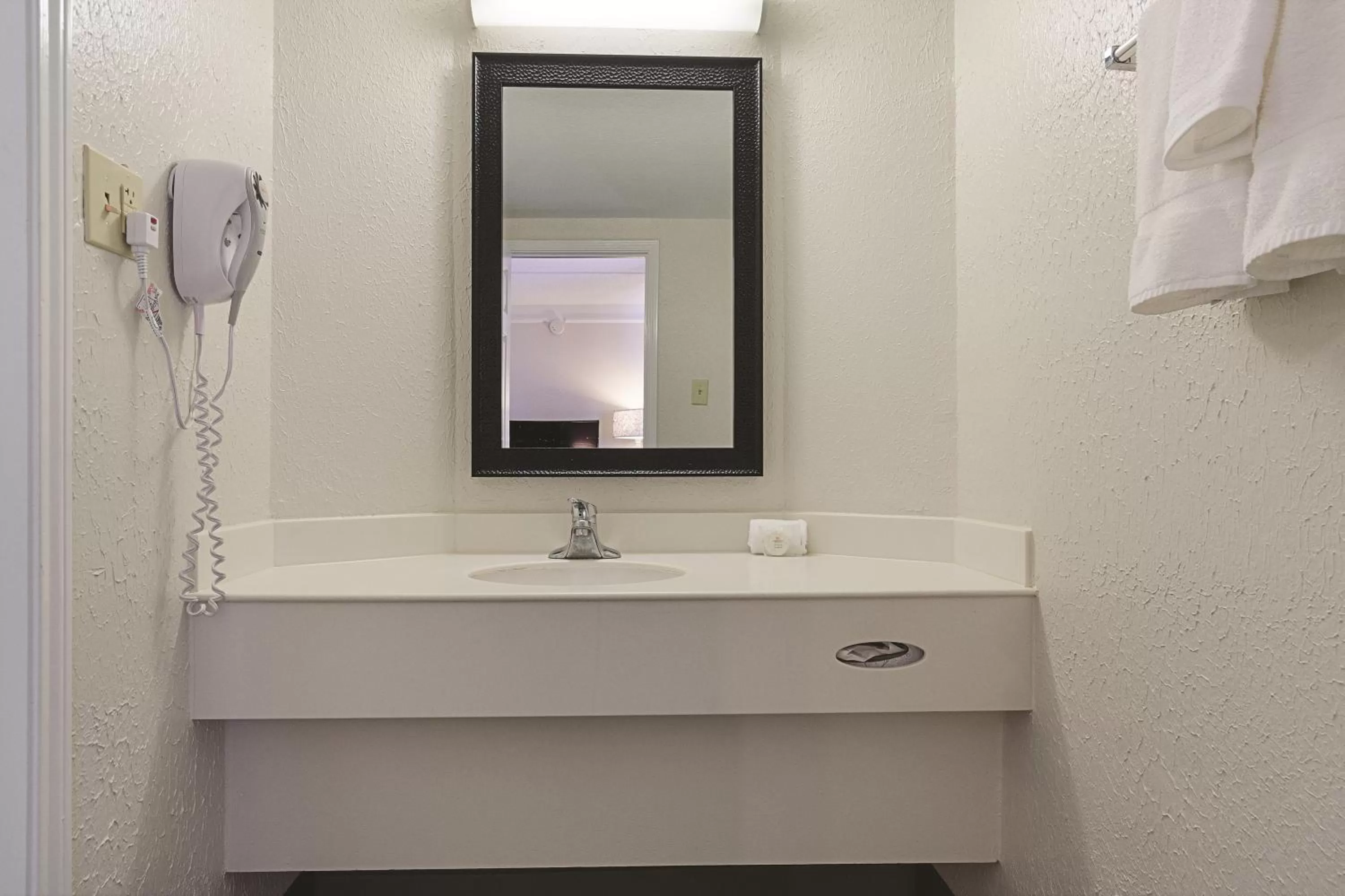 Bathroom in Baymont by Wyndham Greenville Woodruff Rd