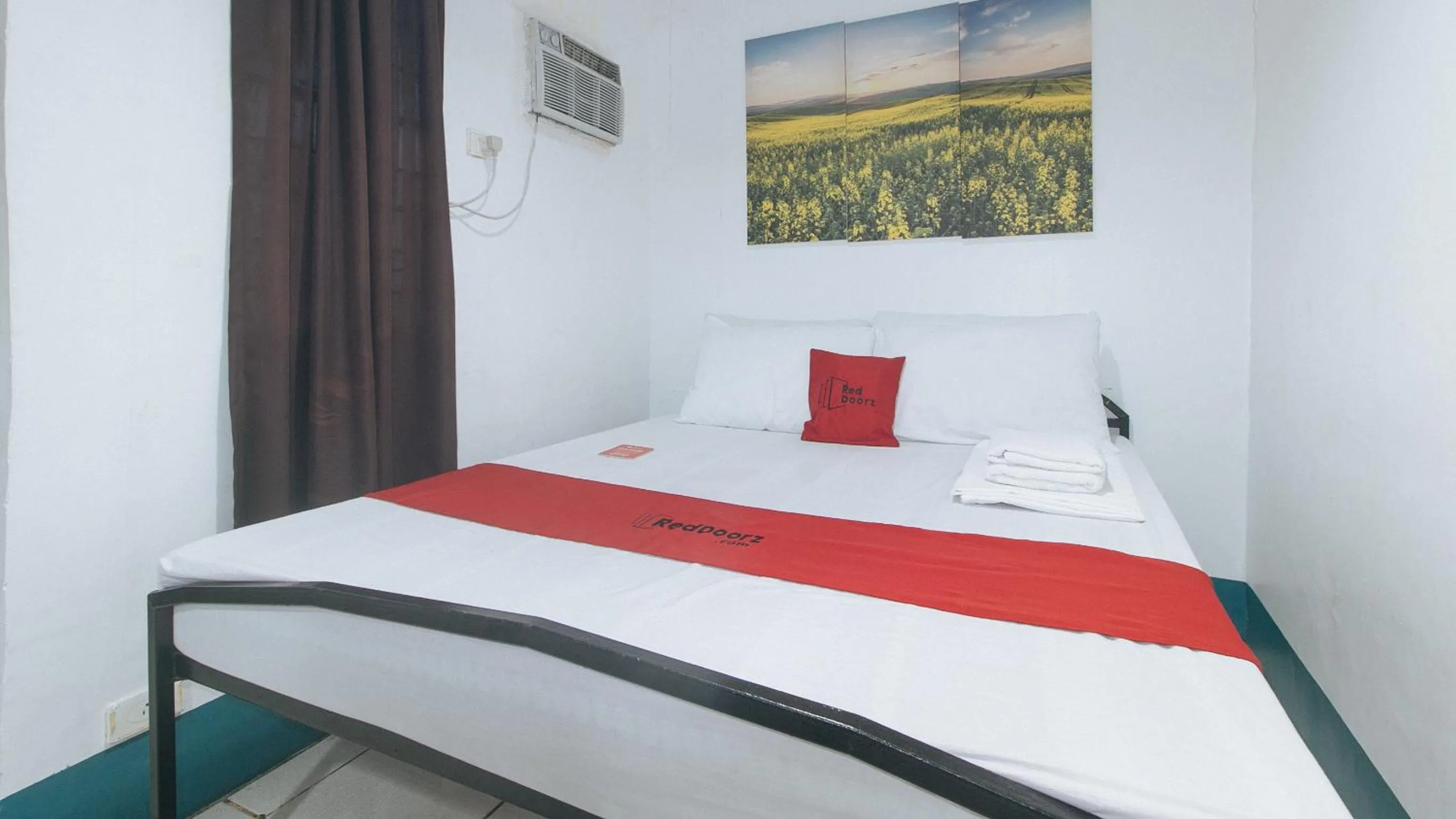 Bed in RedDoorz at Crowne One Condo