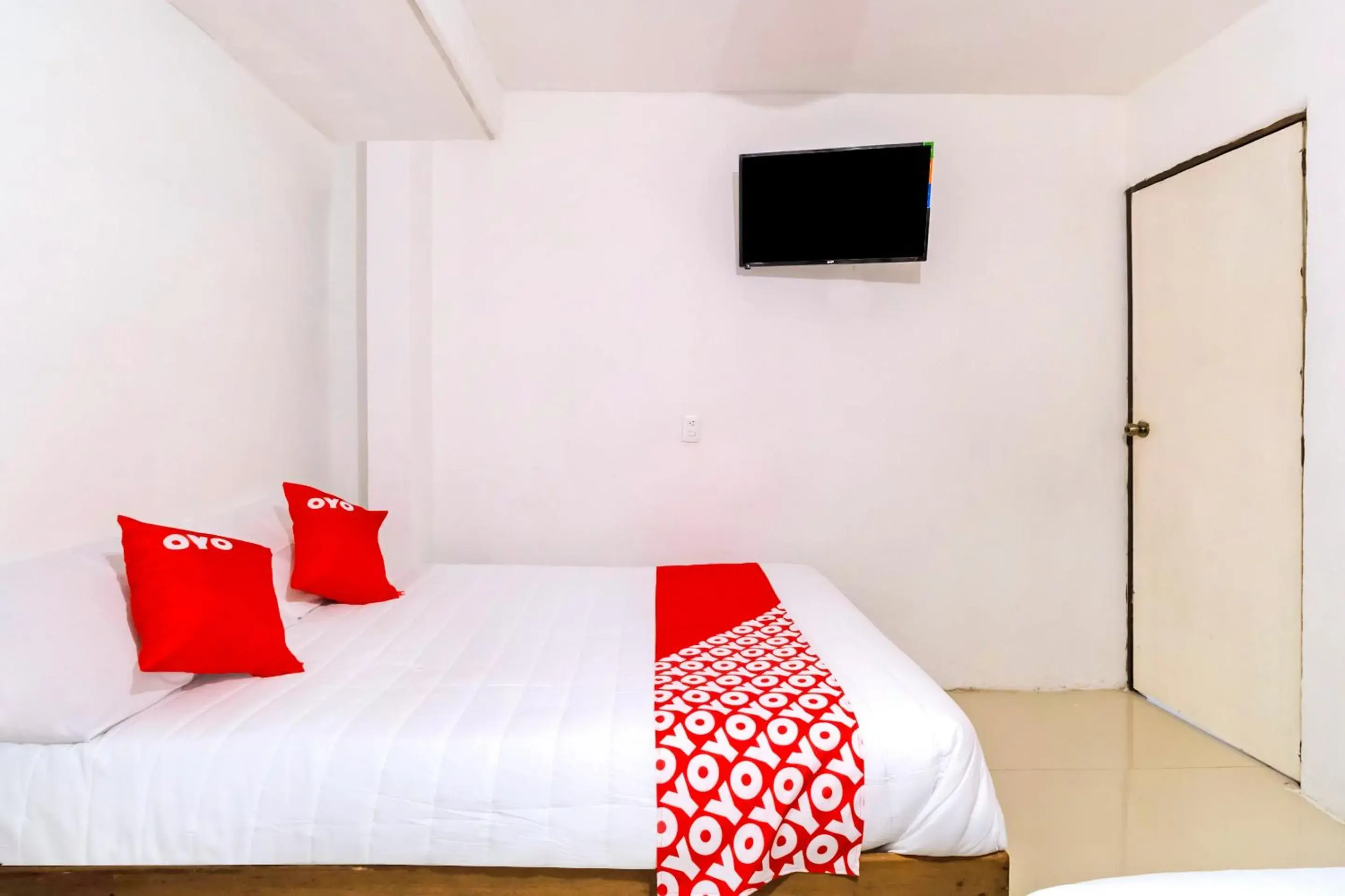 TV and multimedia, Bed in OYO Hotel Punta Guadalupe, San Cristóbal de las Casas