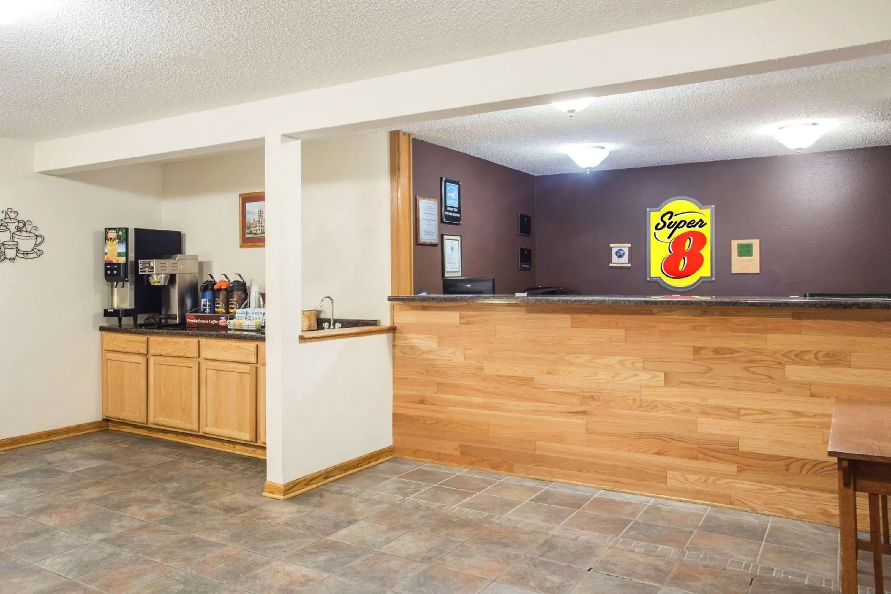 Lobby or reception in Super 8 by Wyndham Monroe WI Lobby or reception in Super 8 by Wyndham Monroe WI