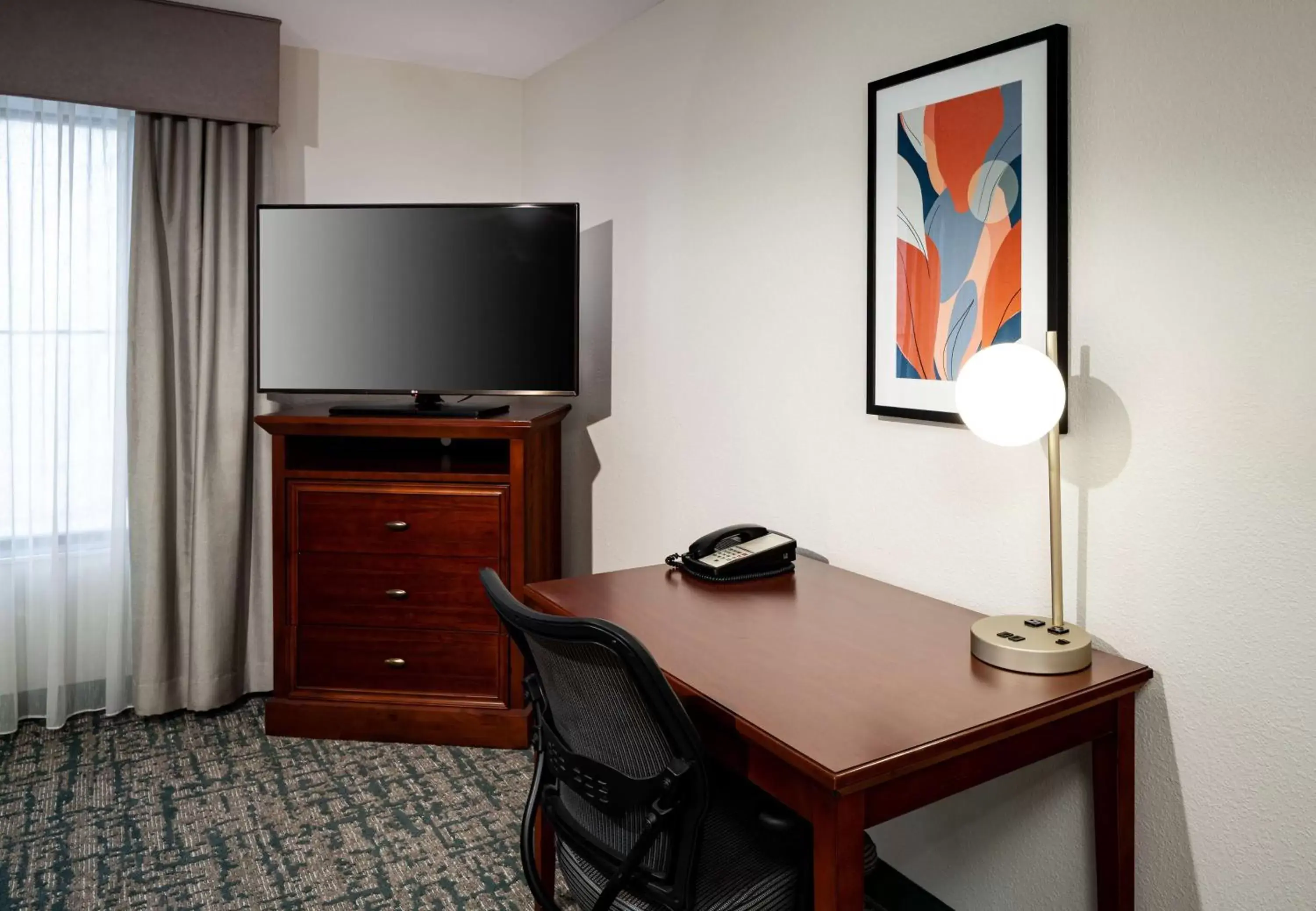Bedroom, TV/Entertainment Center in Homewood Suites by Hilton Jacksonville-South/St. Johns Ctr.