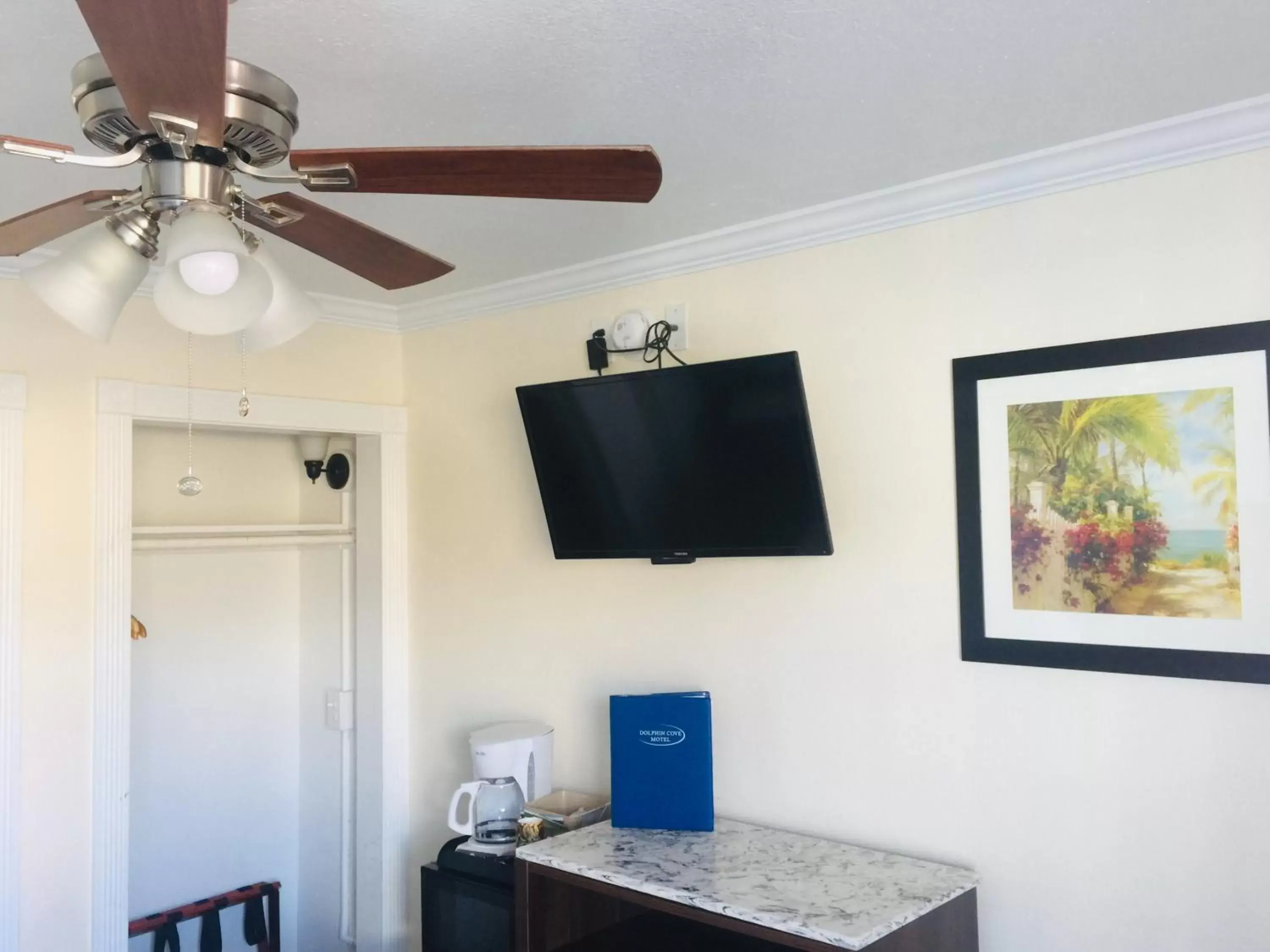 TV/Entertainment Center in Dolphin Cove Motel