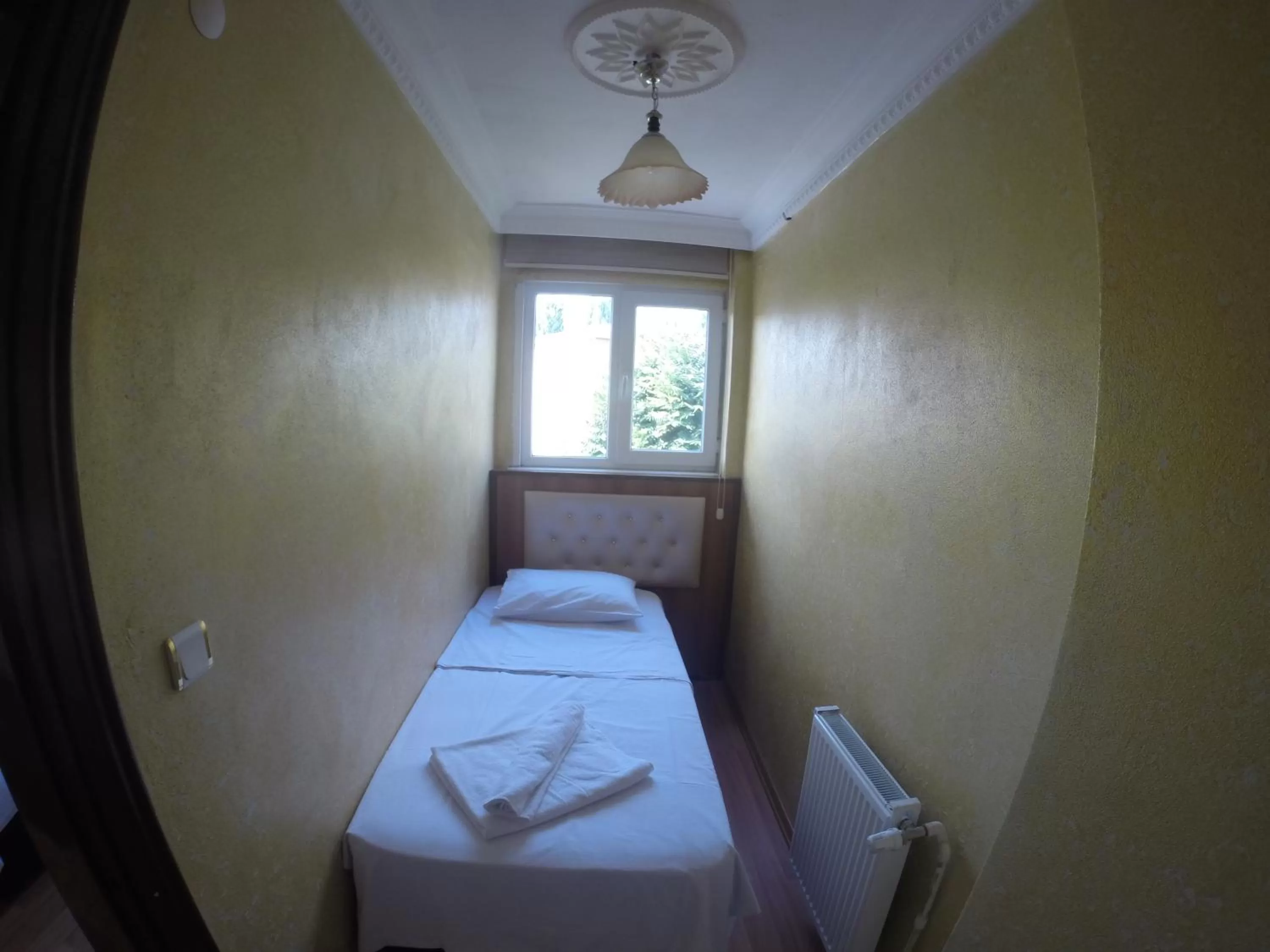 Bed in Arat Apartments