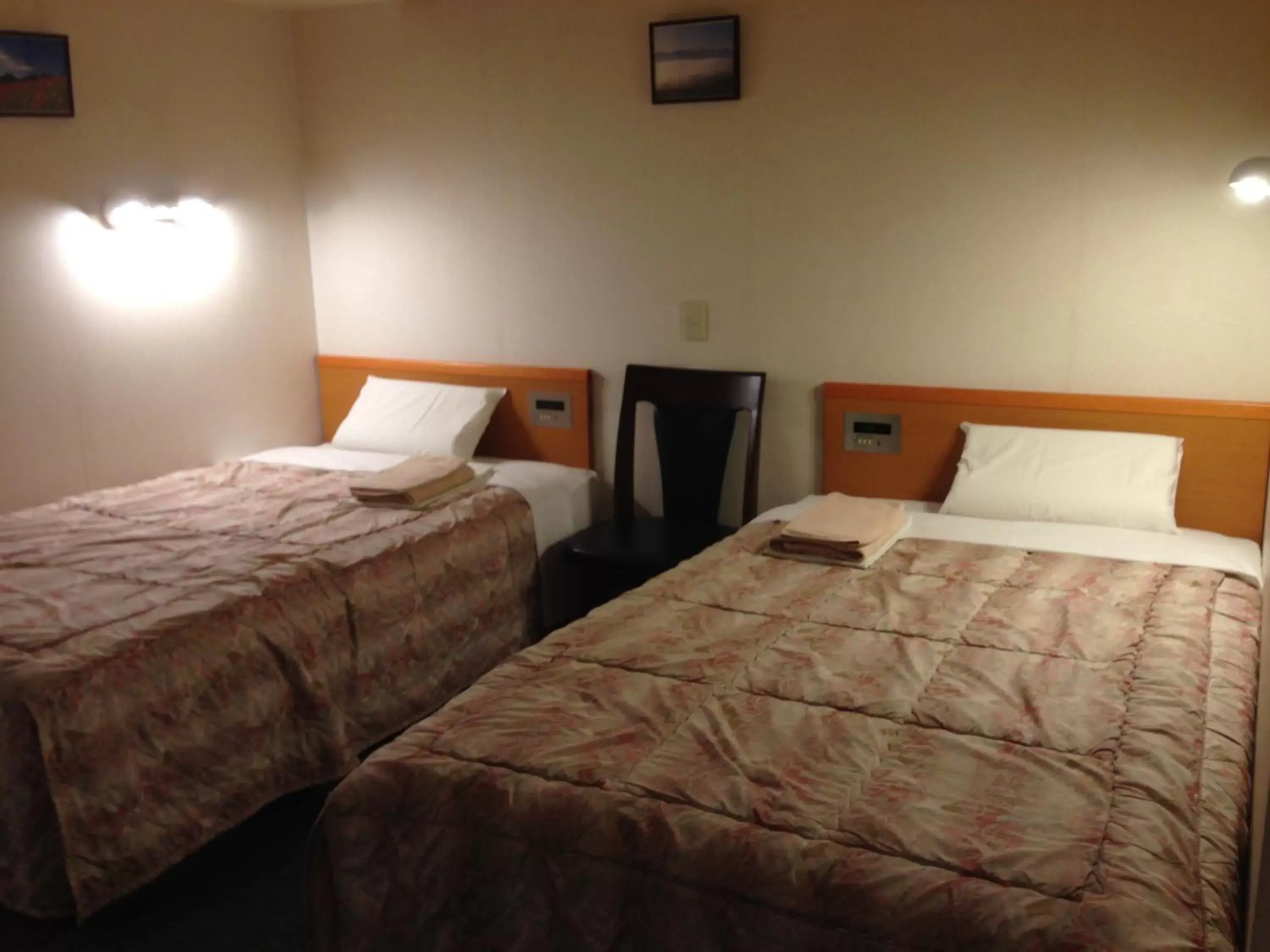 Photo of the whole room, Bed in Hotel Crown Hills Oita
