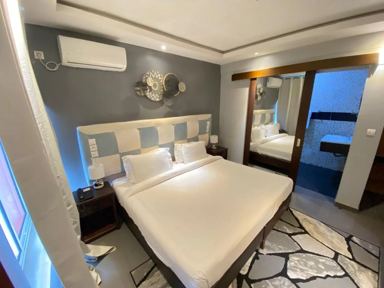 Bedroom in Fini Hotel Bobende