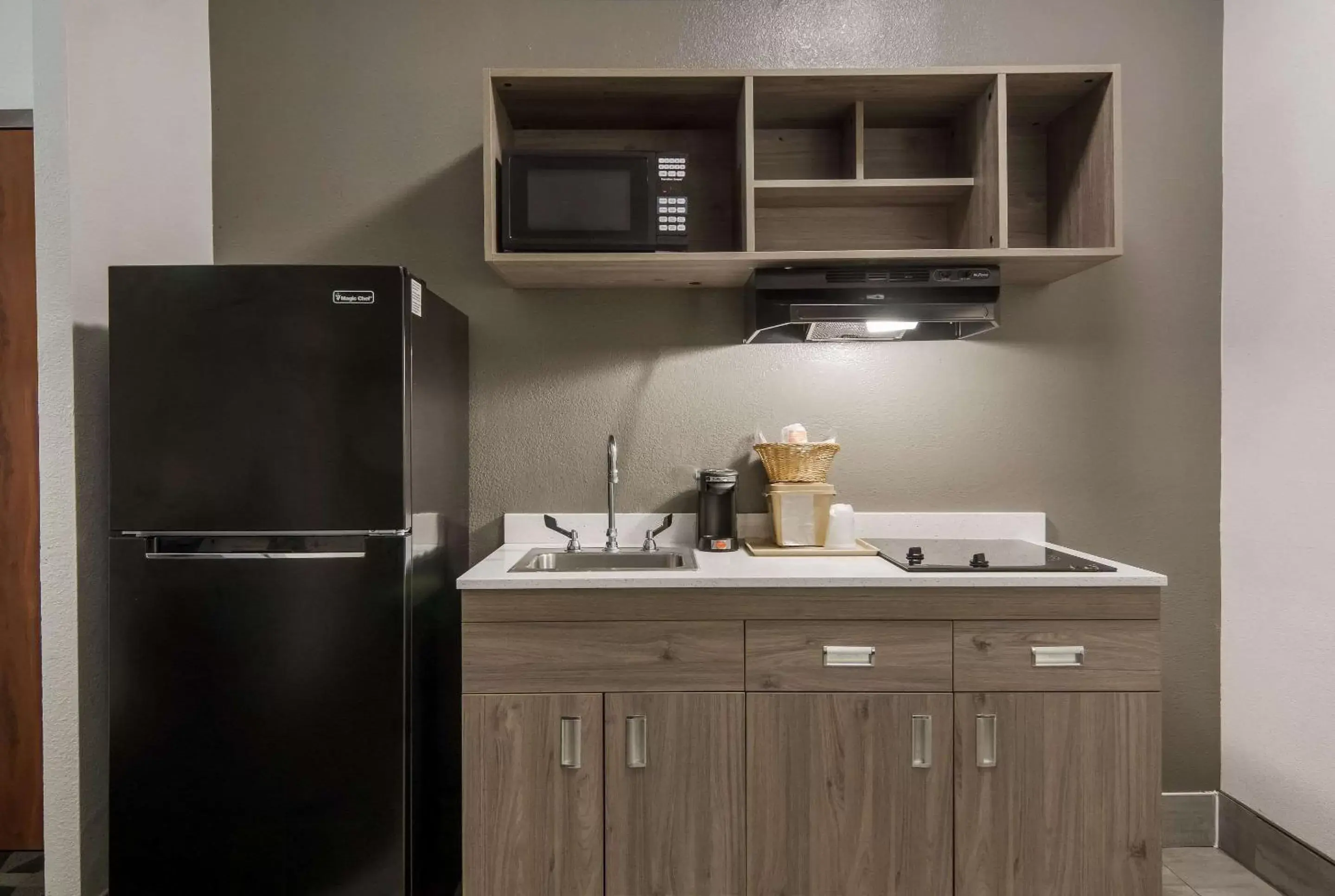 Bedroom, Kitchen/Kitchenette in Quality Inn & Suites