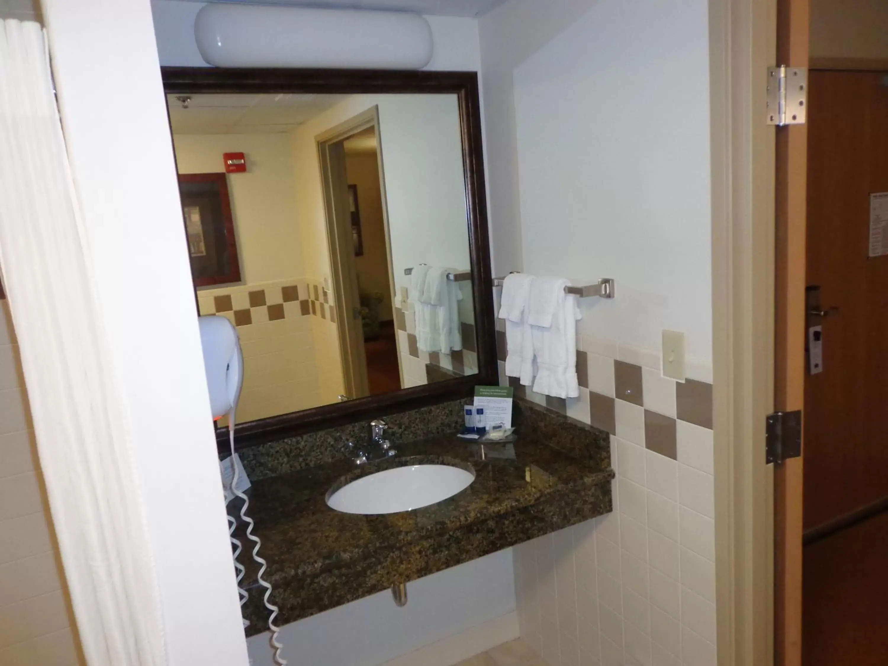 Bathroom in AmericInn by Wyndham Fort Pierre Conference Center