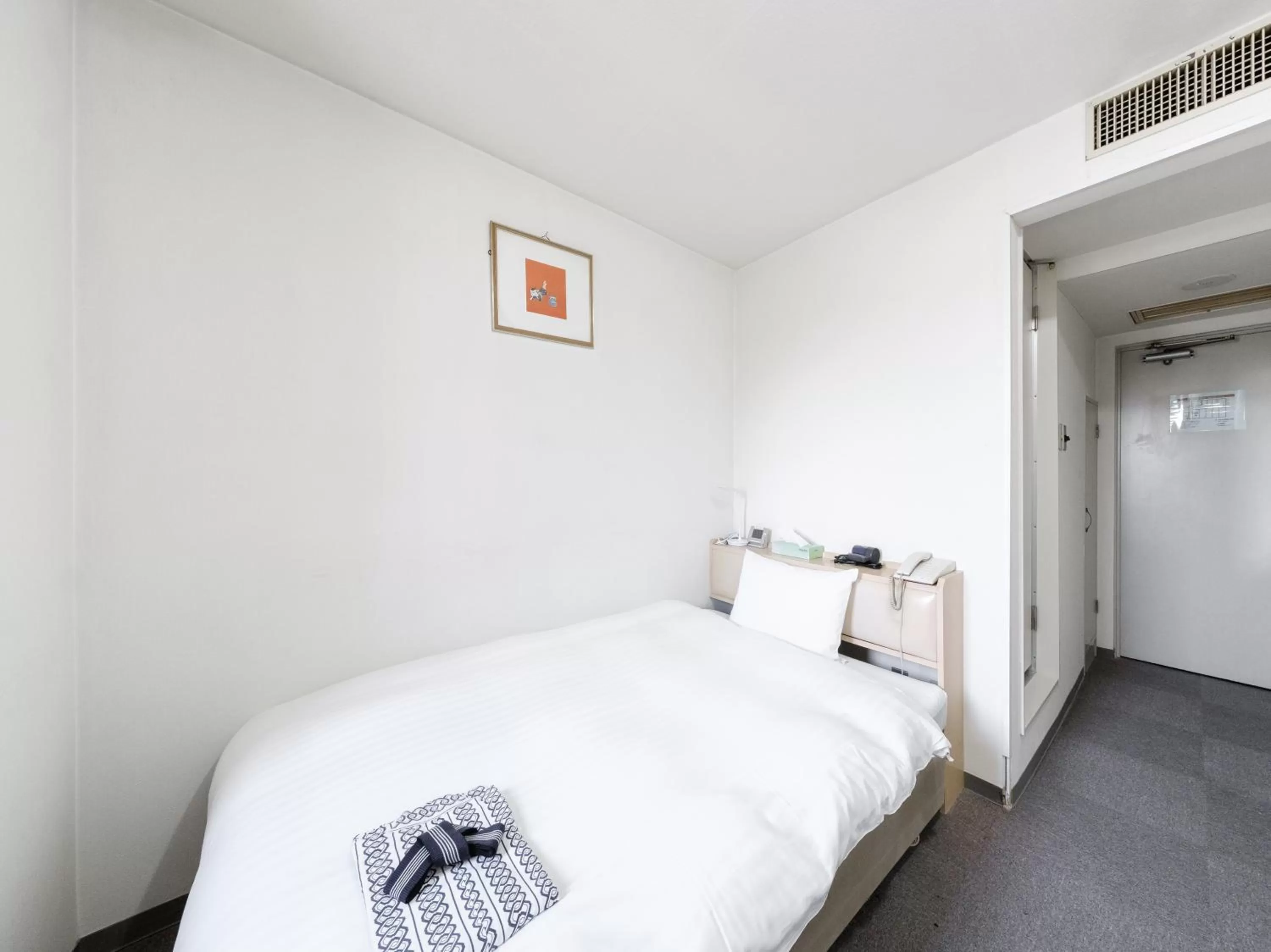 Bed in Tabist THE GREEN ASAHIKAWA