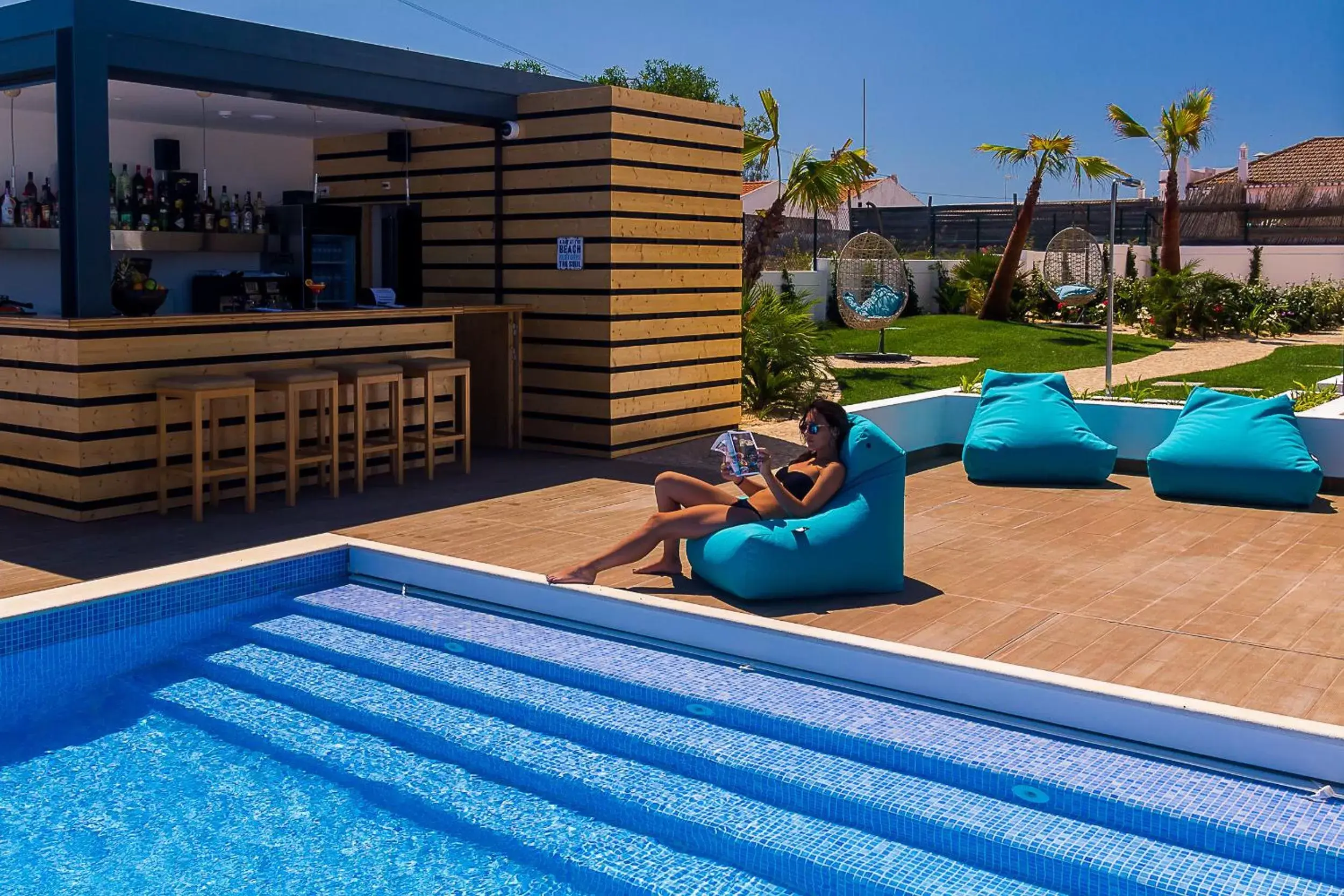 Lounge or bar, Swimming Pool in Mareta Beach House - Boutique Residence