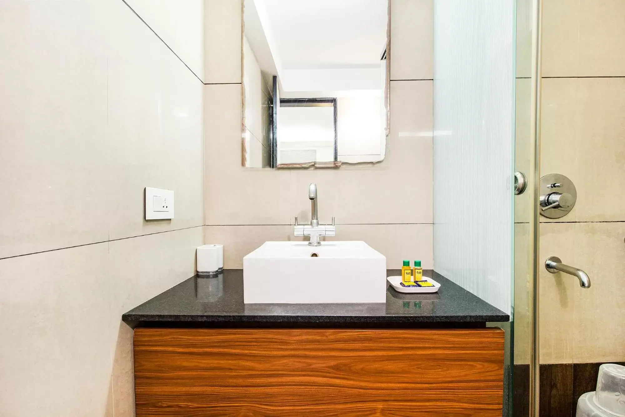 Bathroom in FabHotel Prime Avenue Bathroom in FabHotel Prime Avenue