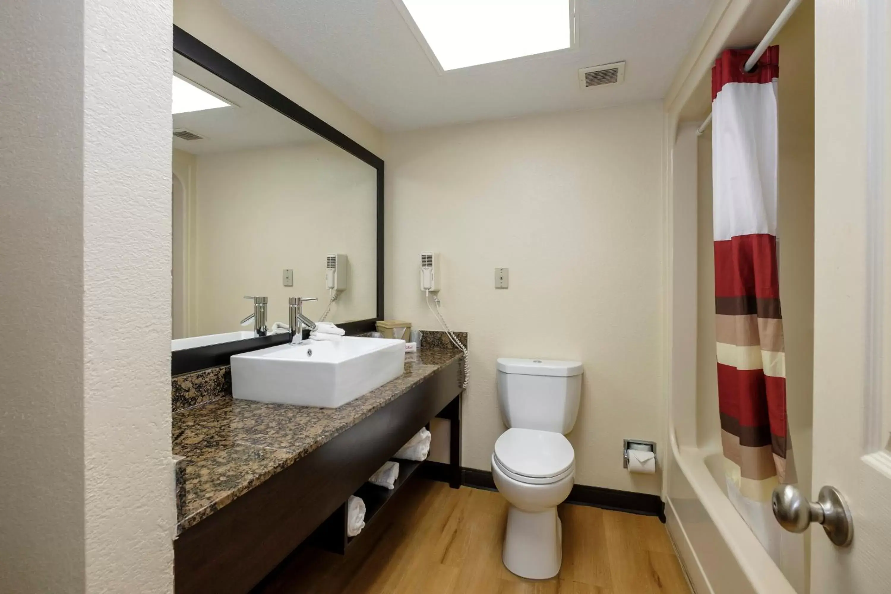 Bathroom in Red Roof Inn PLUS+ & Suites Opelika