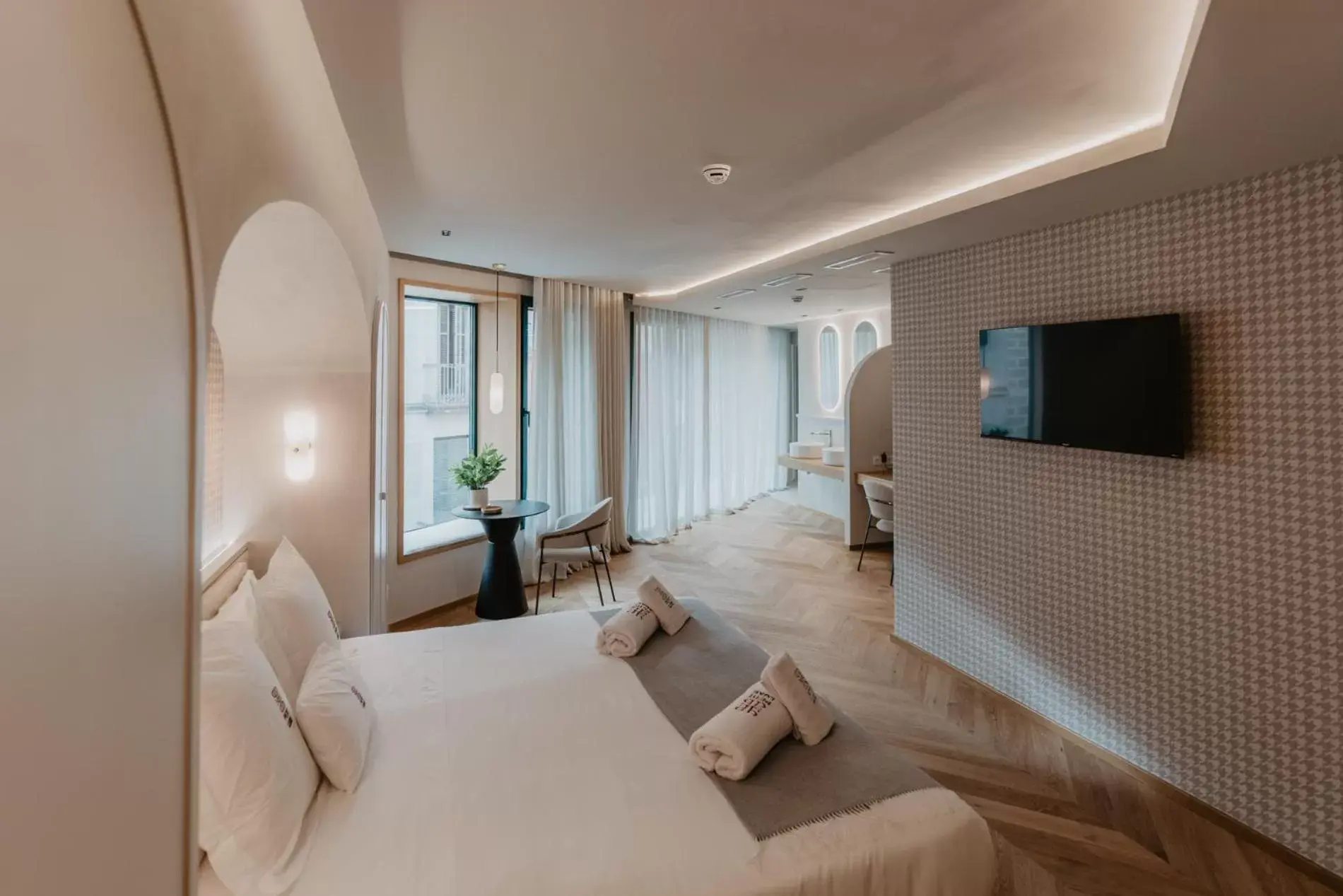 TV and multimedia in Hotel Boutique Petit Luxe