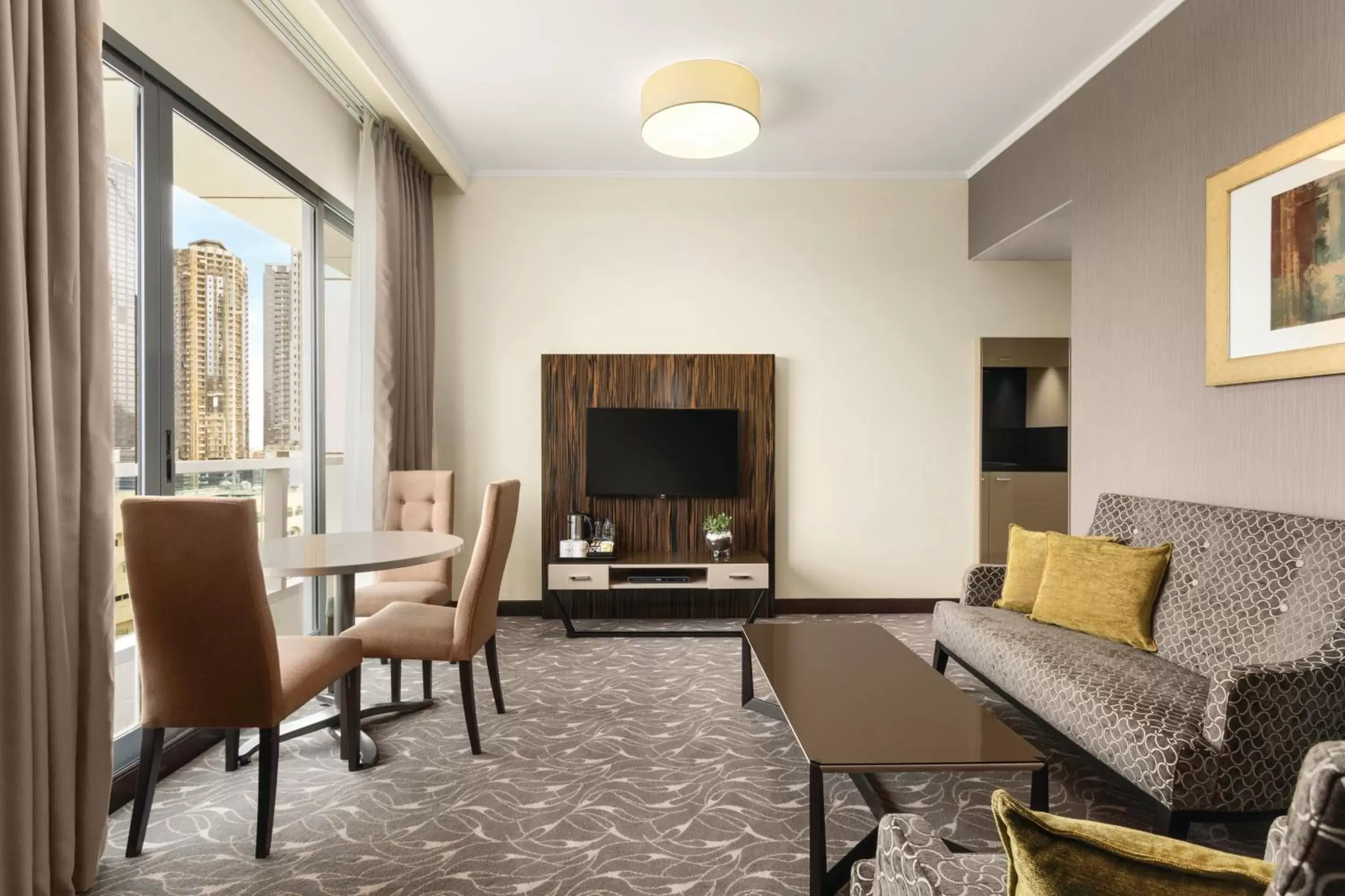 Living room, Seating Area in Hawthorn Suites by Wyndham Abu Dhabi City Center