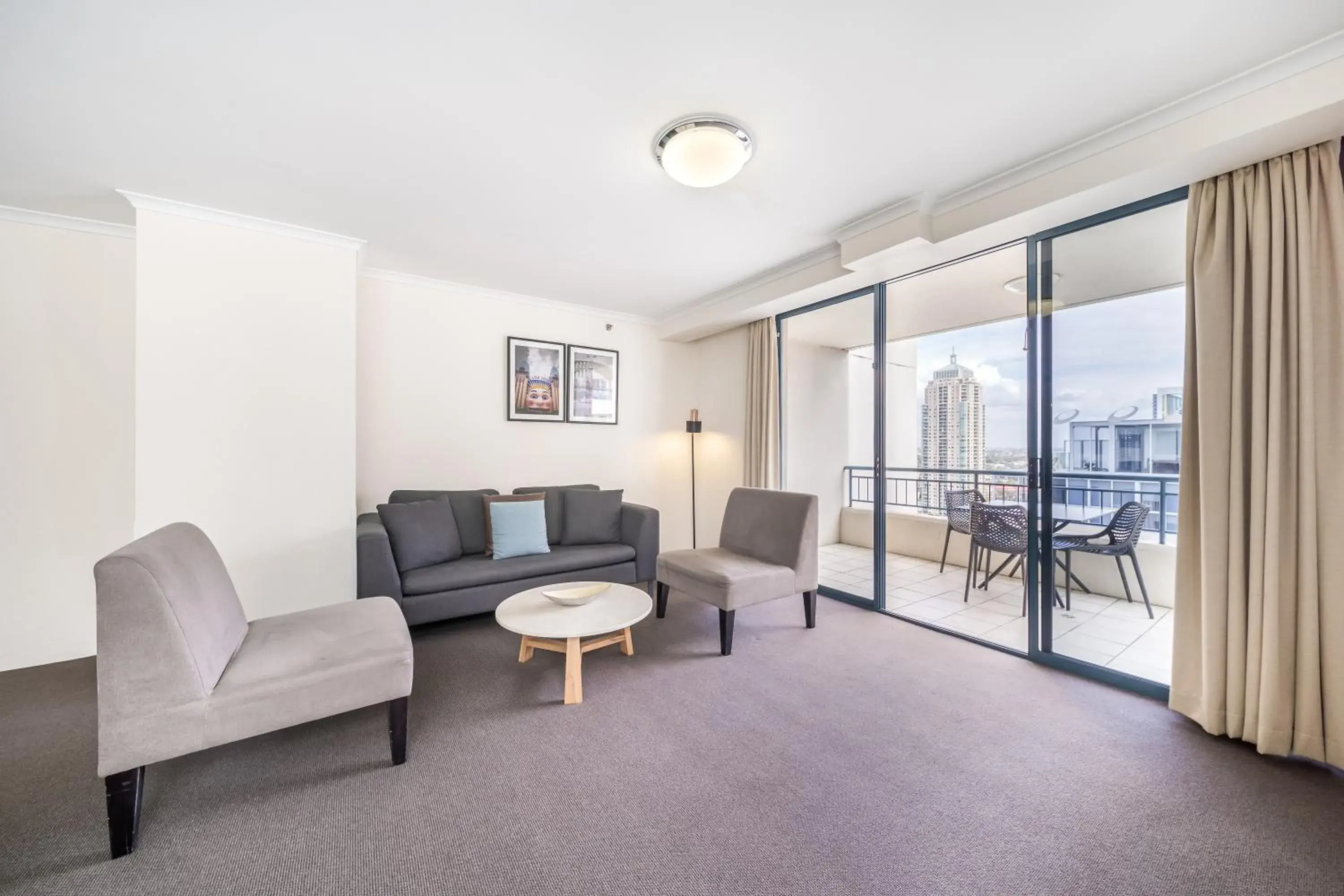 Living room, Seating Area in Oaks Sydney Castlereagh Suites