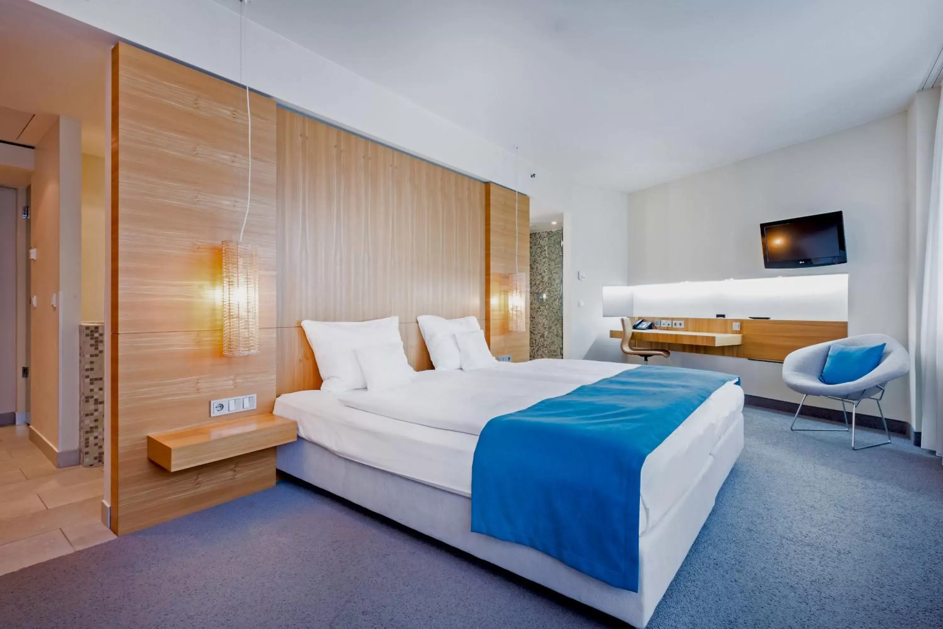 Photo of the whole room, Bed in Lindner Hotel Berlin Ku'damm, part of JdV by Hyatt