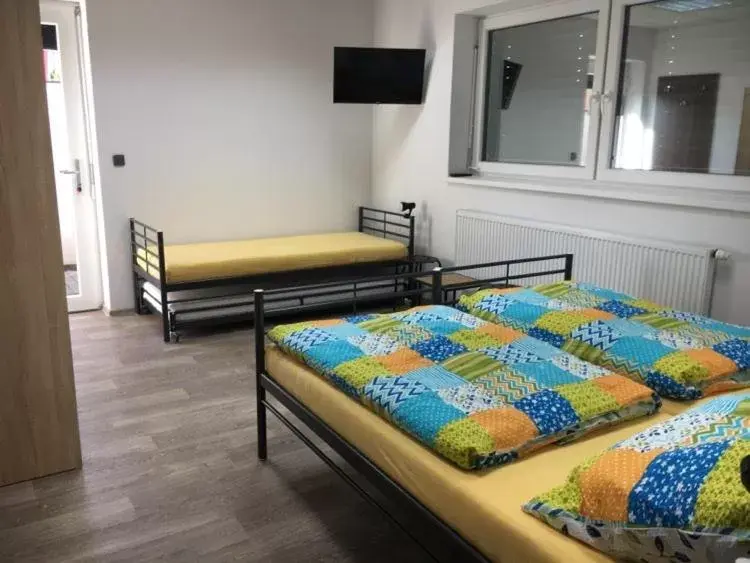 Triple Room with Shared Bathroom in Ubytování U Jirky-Mutěnice Triple Room with Shared Bathroom in Ubytování U Jirky-Mutěnice