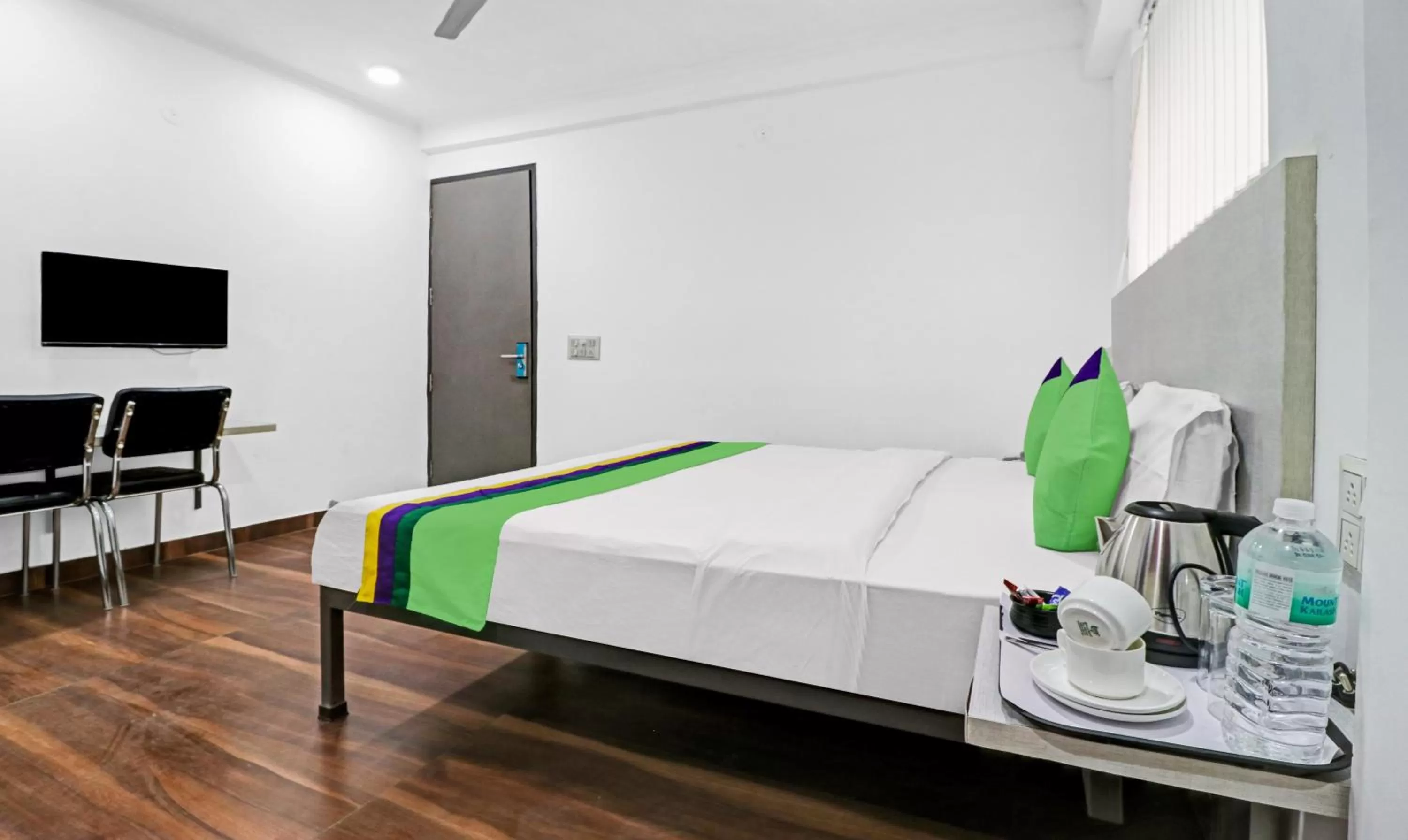 Bedroom, Bed in Treebo Grand Town House