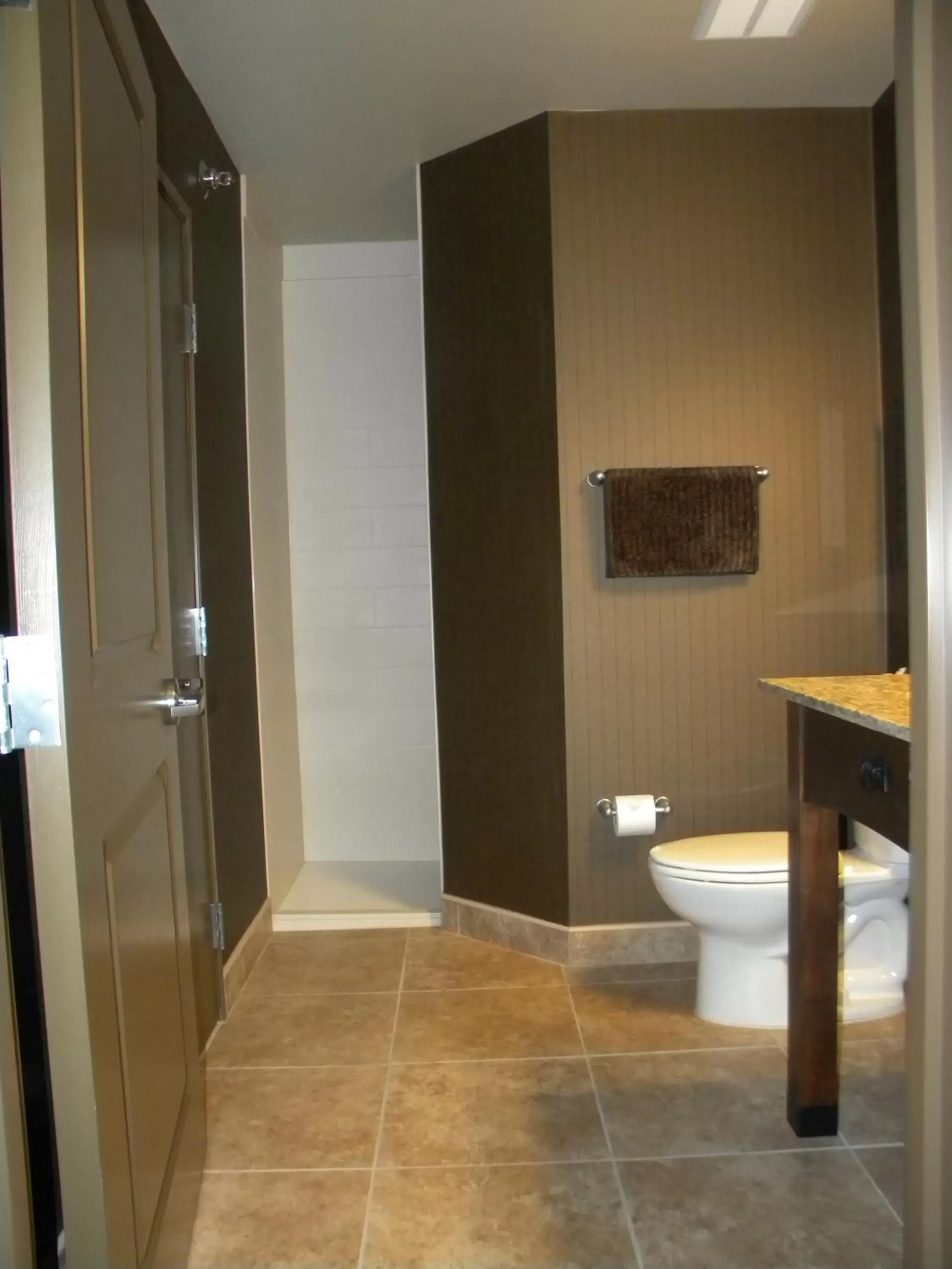 Toilet, Bathroom in Teddy's Residential Suites Watford City