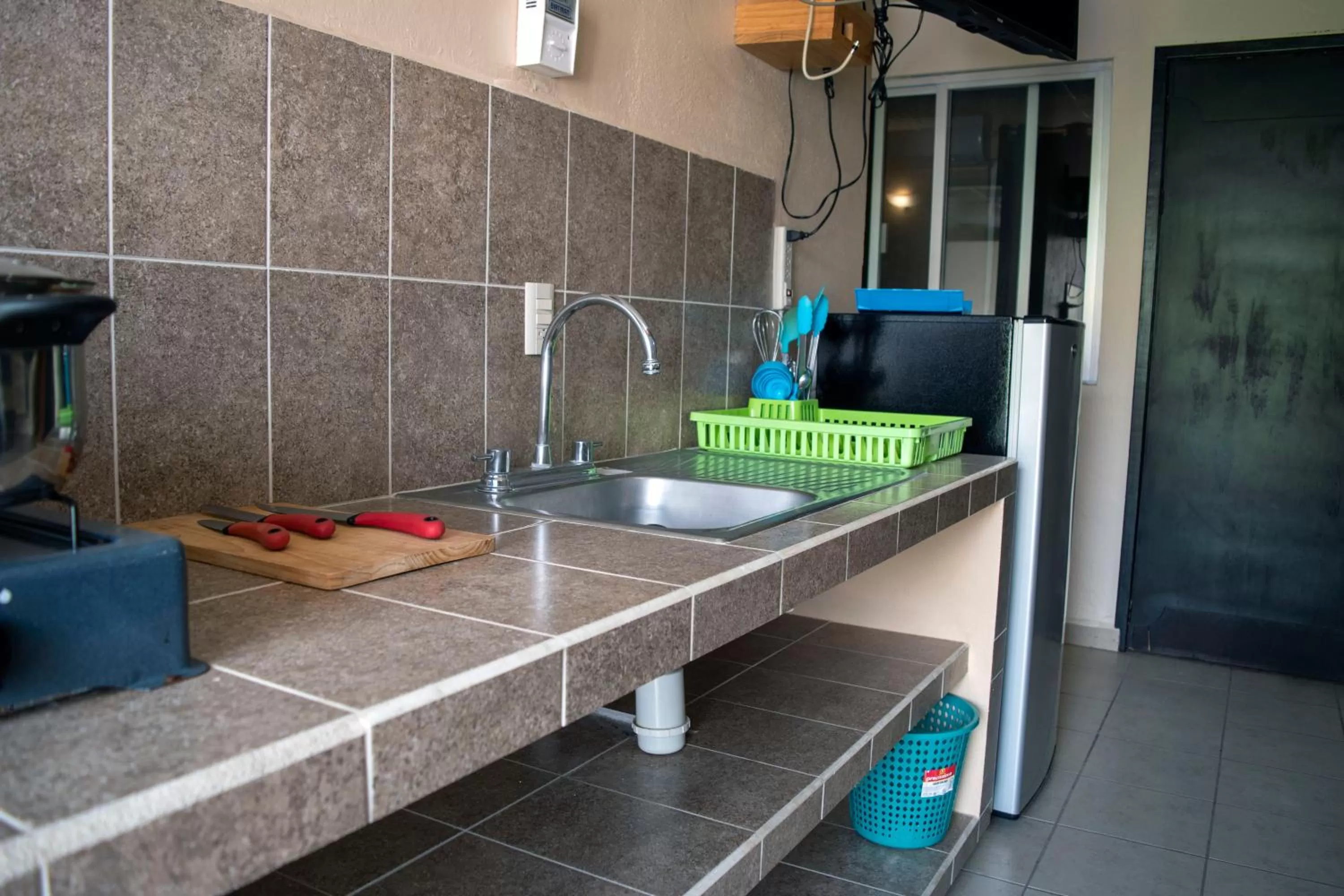 Kitchen or kitchenette in Isabel Suites