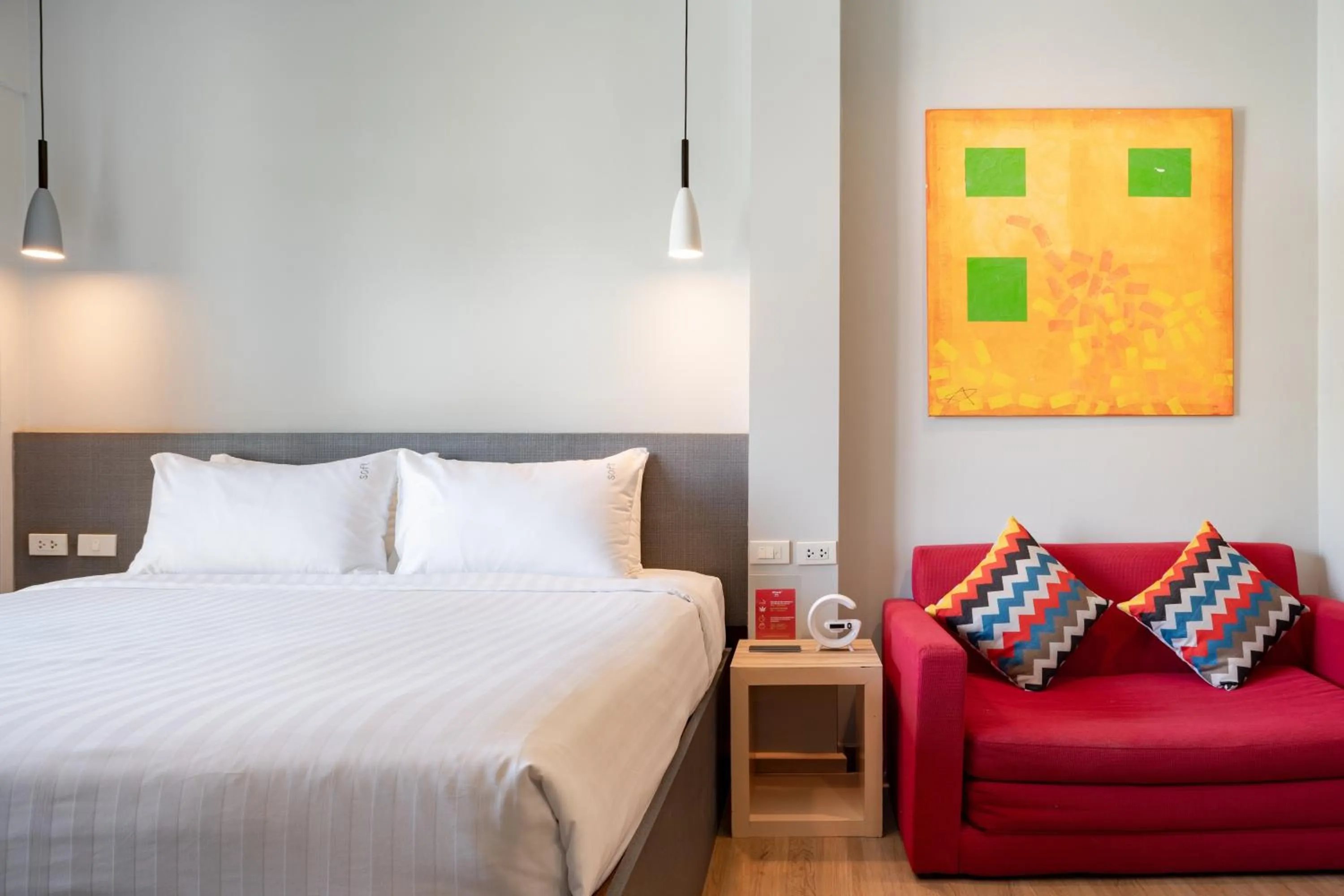 Seating area, Bed in iCheck inn Gems Center Silom