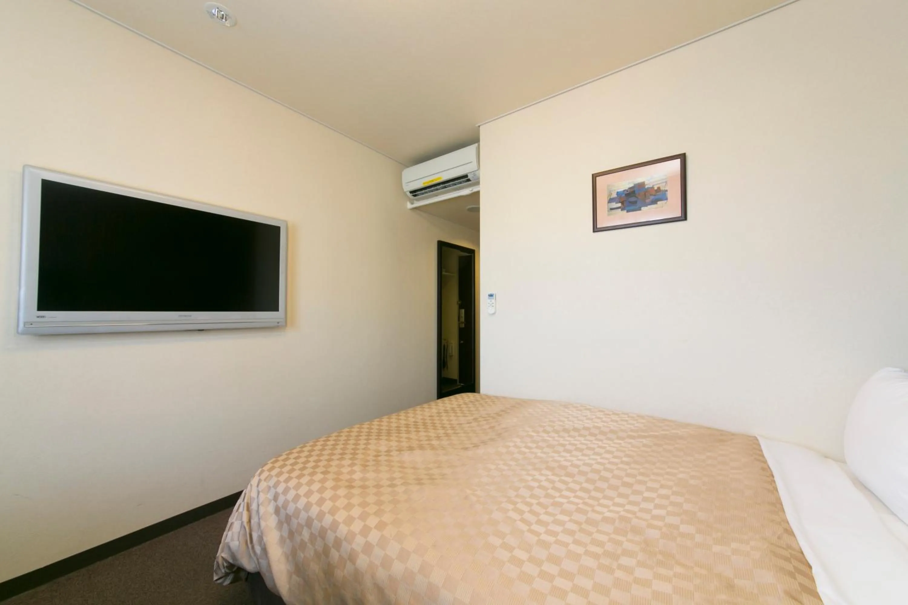 Bed in Hotel nanvan浜名湖