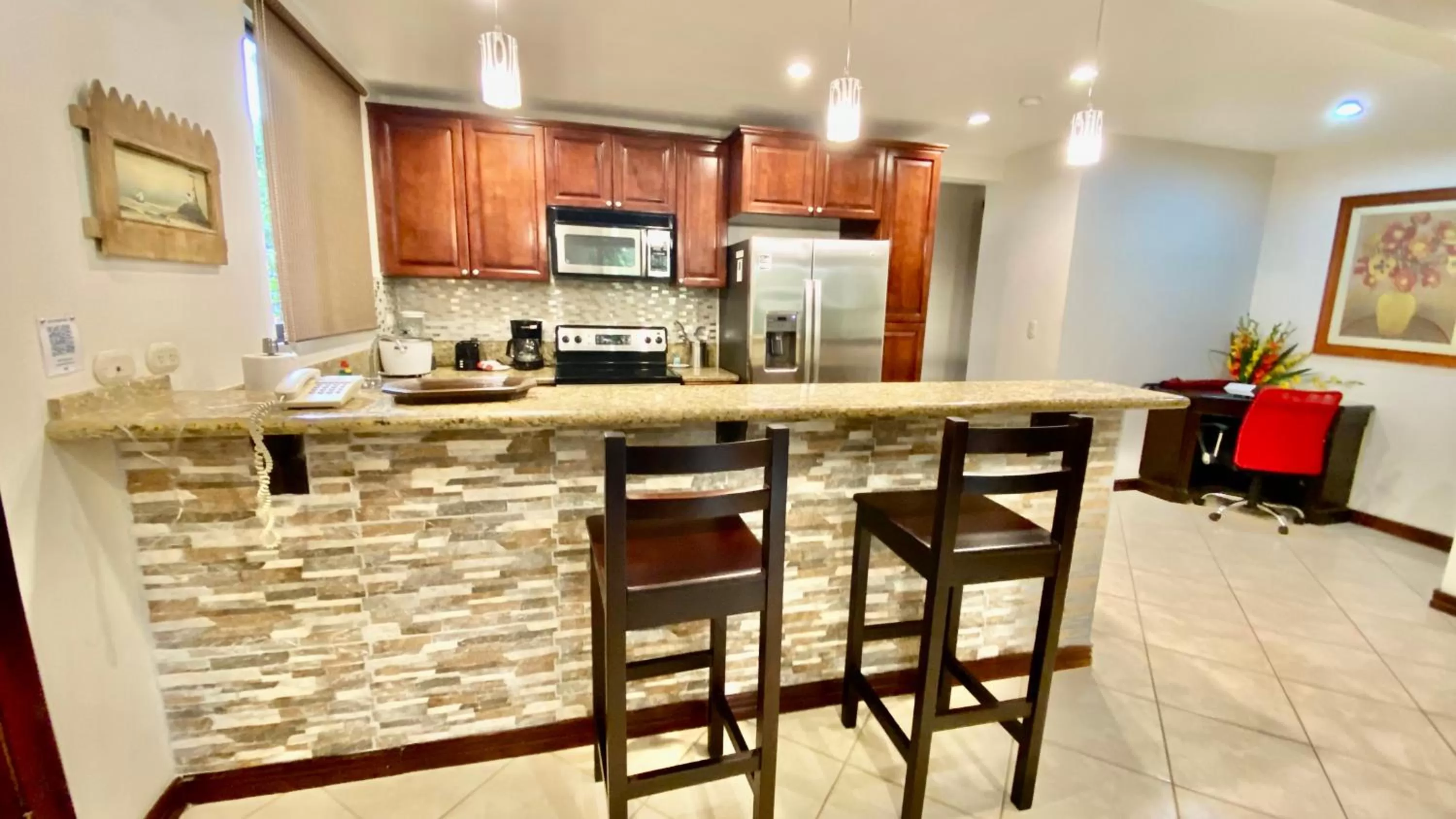 Kitchen or kitchenette in Monte Carlo Luxury Condominiums