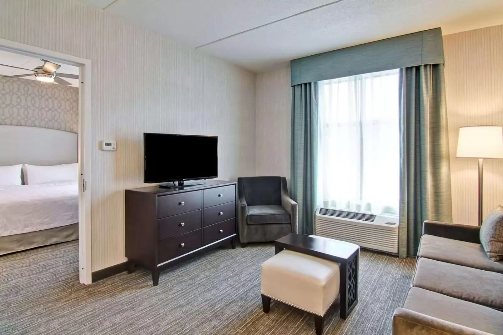 Living room, Bed in Homewood Suites By Hilton Clifton Park