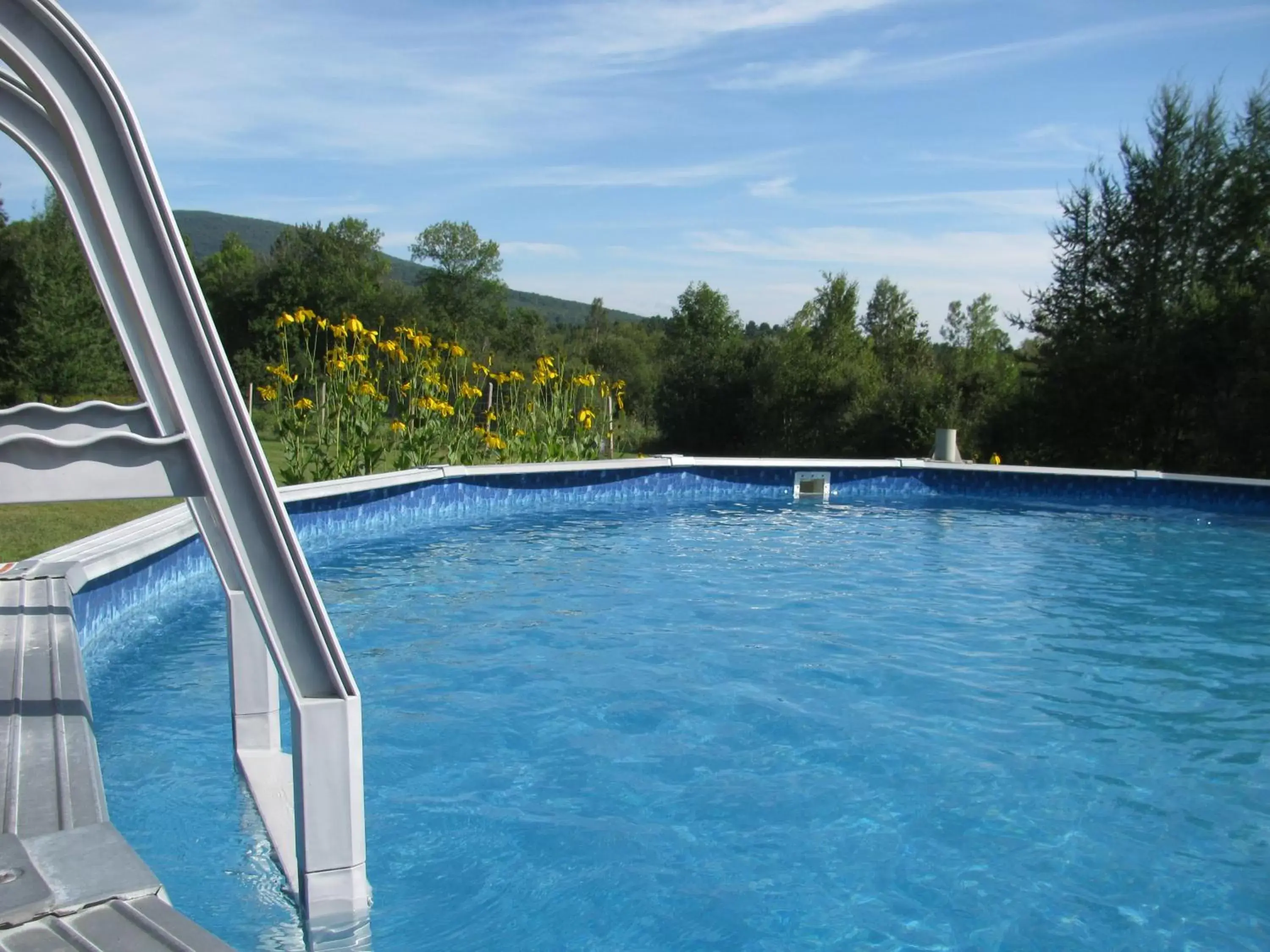 Swimming Pool in Gî'Temps couette et café B&B