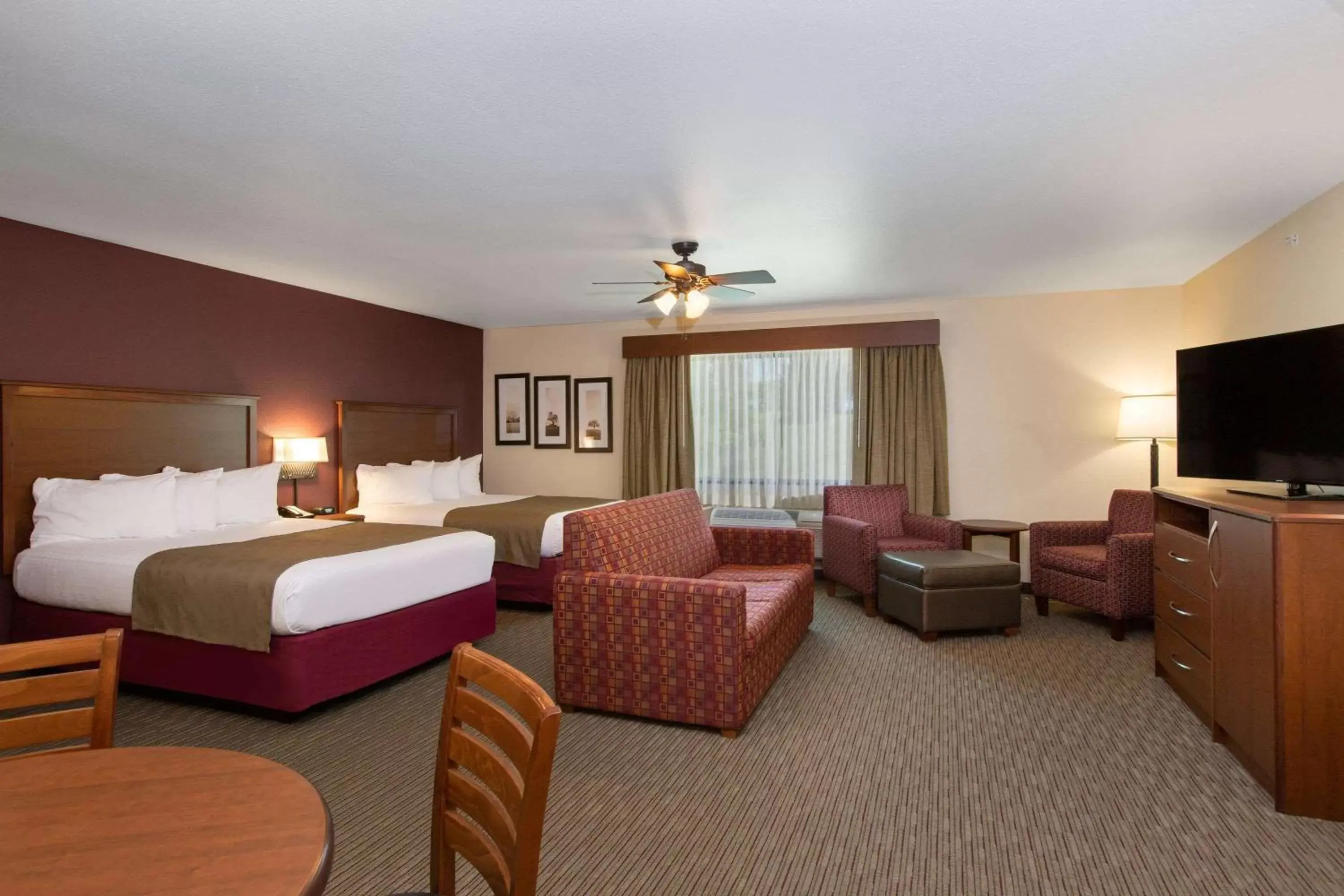 Photo of the whole room in AmericInn by Wyndham Merrill