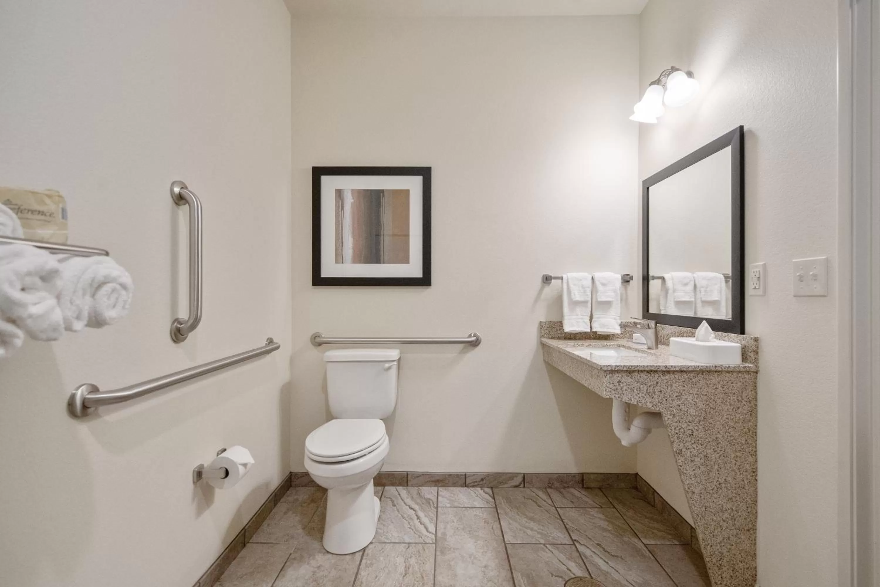 Toilet in Cobblestone Hotel & Suites - Austin