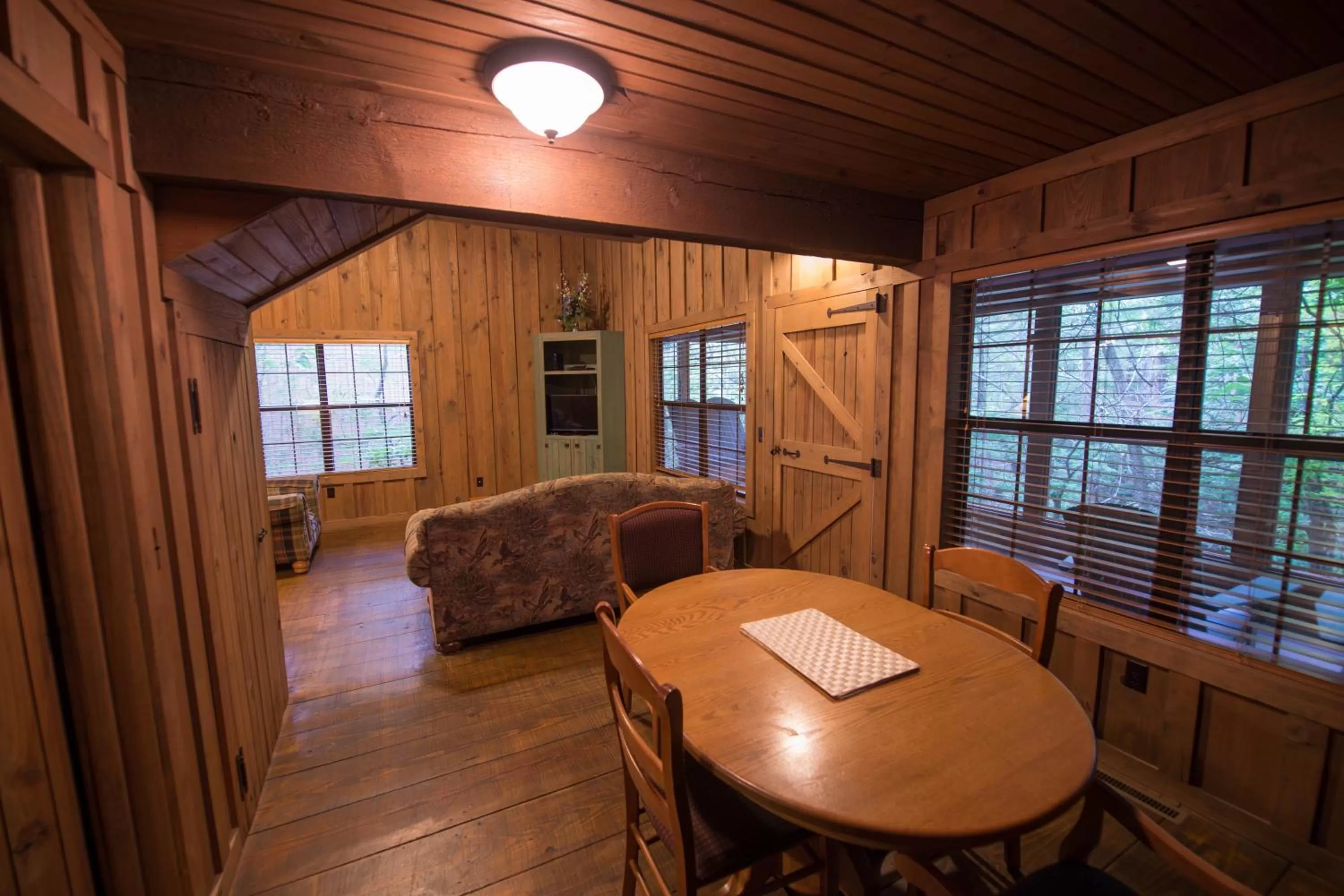 Dining area in Cabins at Green Mountain, Trademark Collection by Wyndham