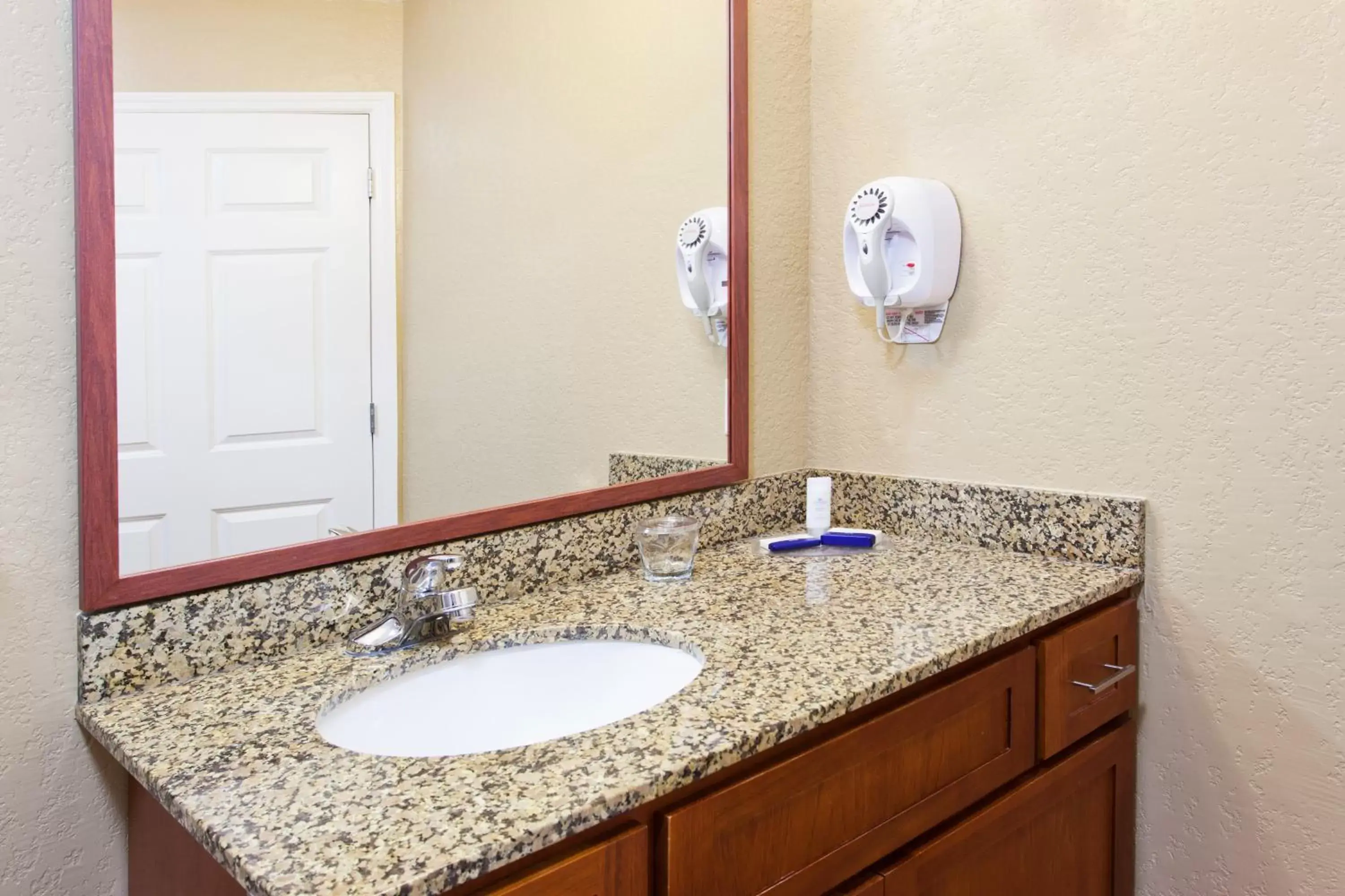 Bathroom in Candlewood Suites Lexington, an IHG Hotel