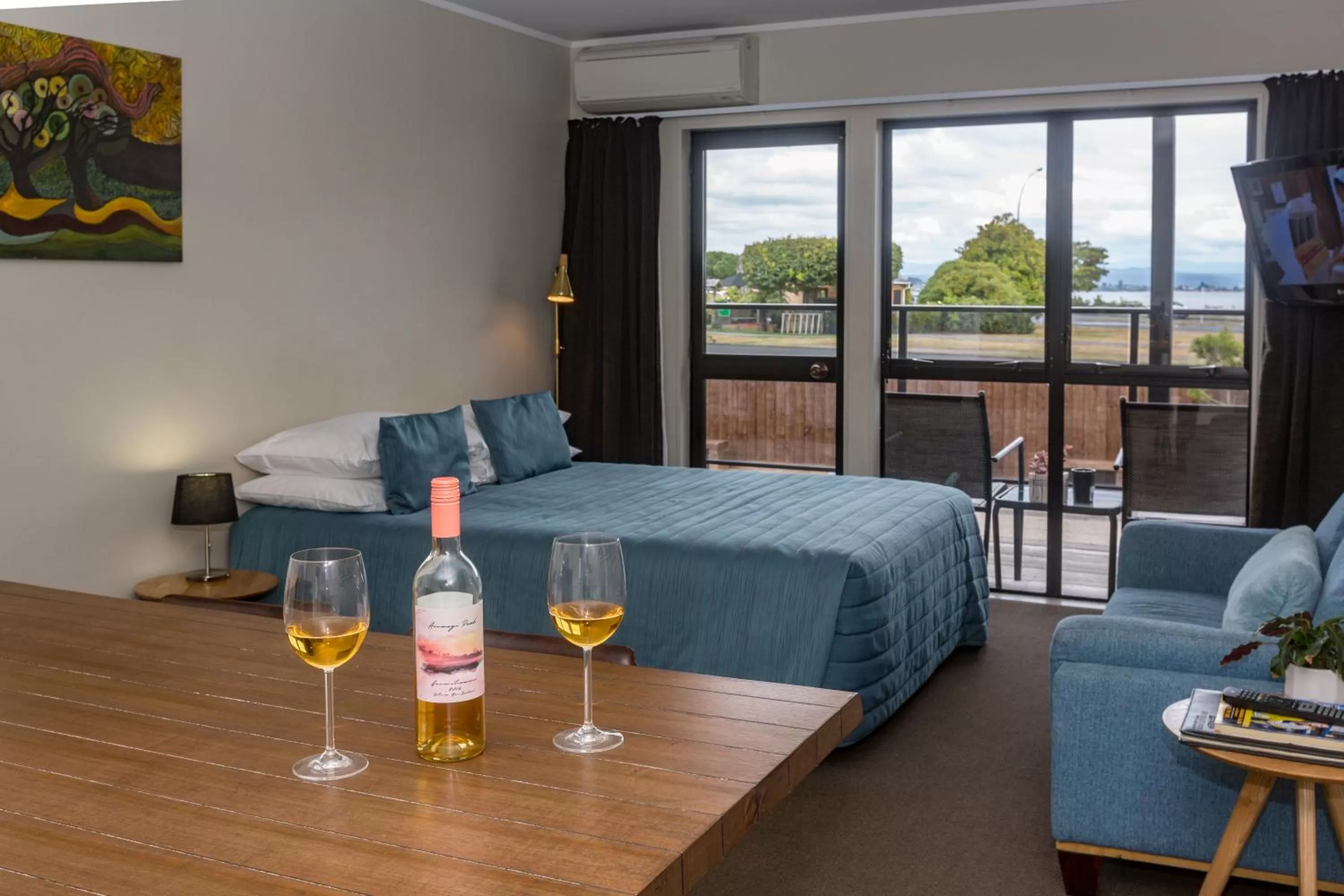 View (from property/room), Bed in Le Chalet Suisse Motel Taupo