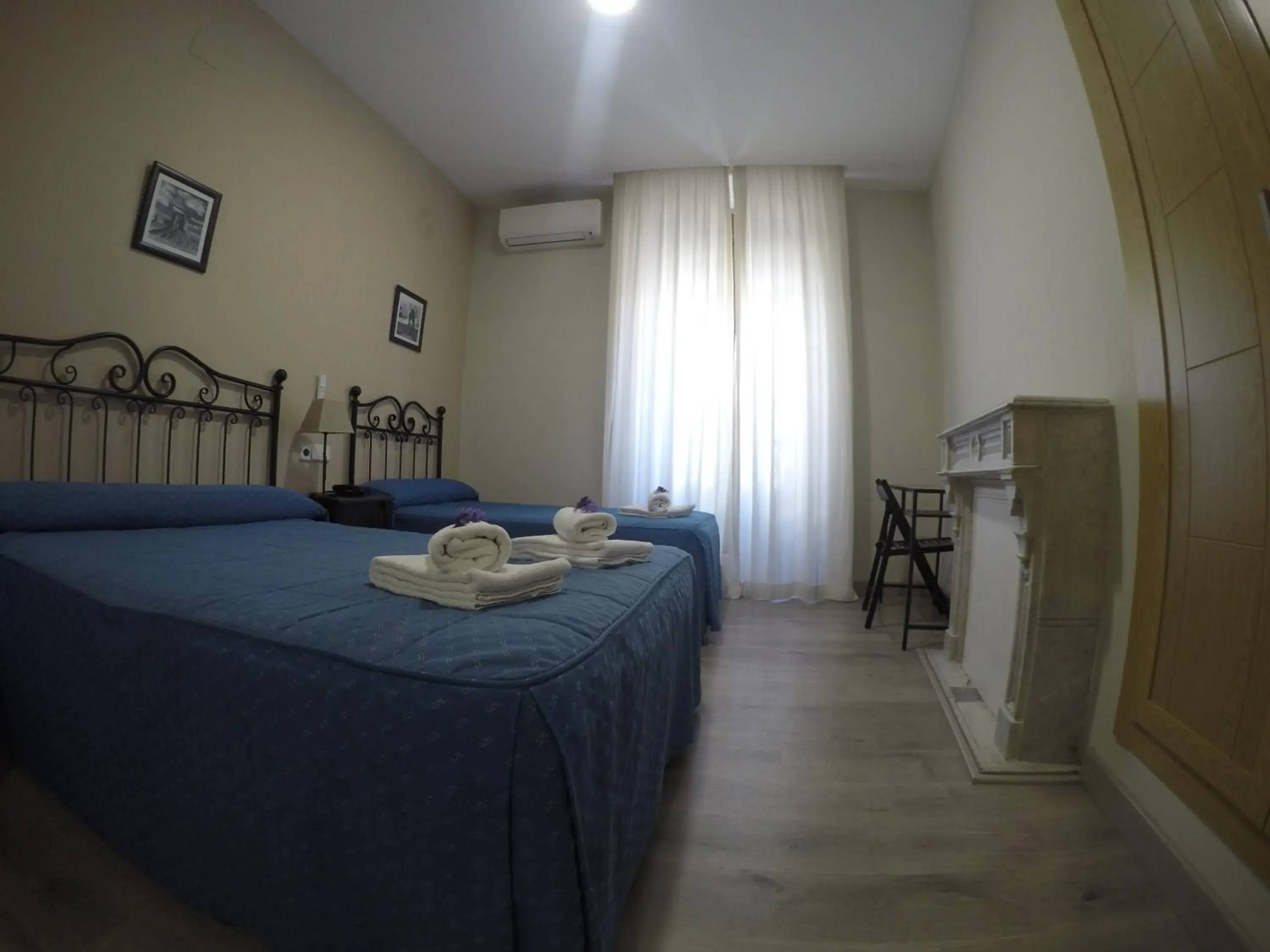 Bedroom in Hostal El Pilar