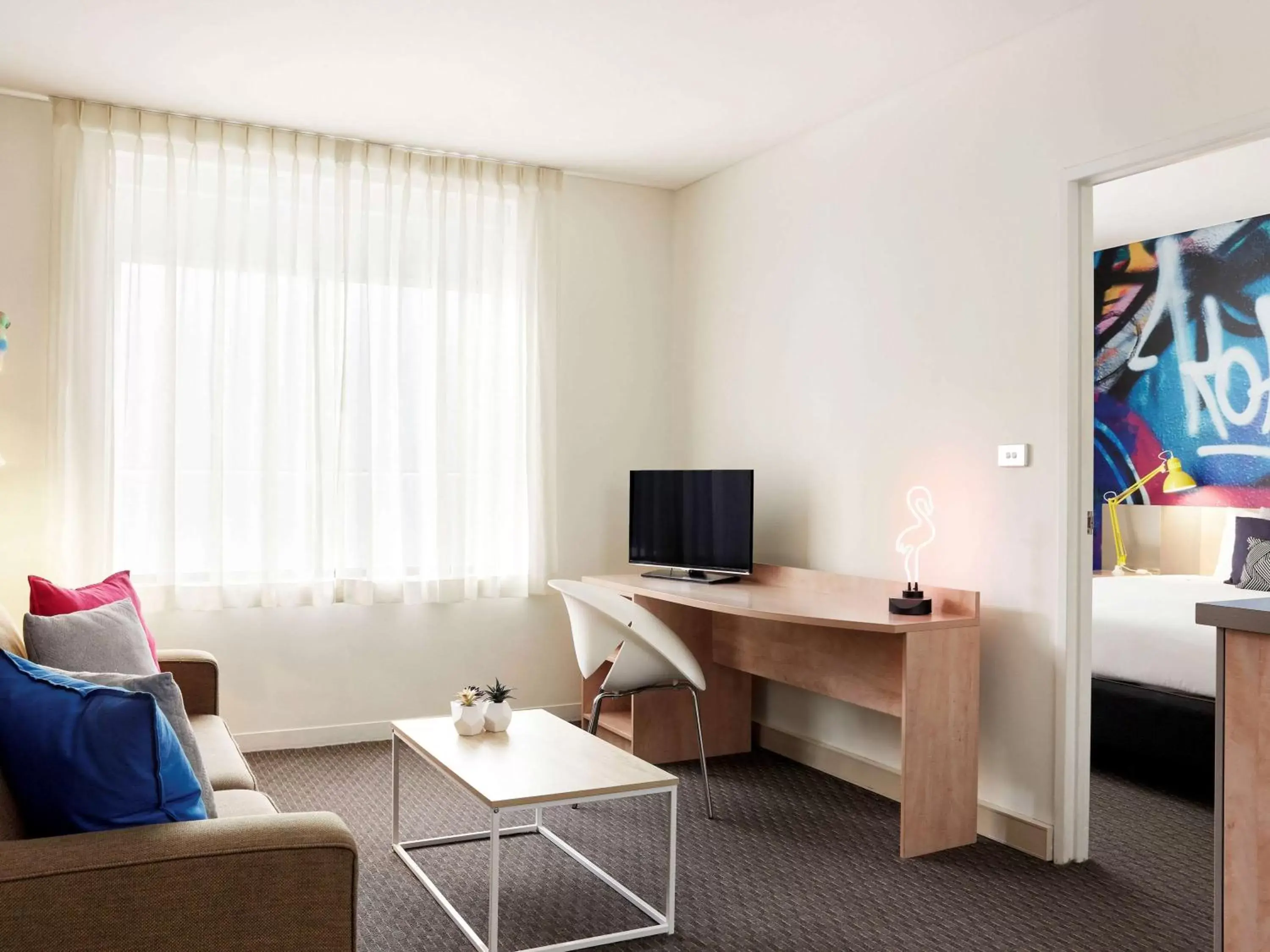 Photo of the whole room, TV/Entertainment Center in ibis Melbourne Hotel and Apartments