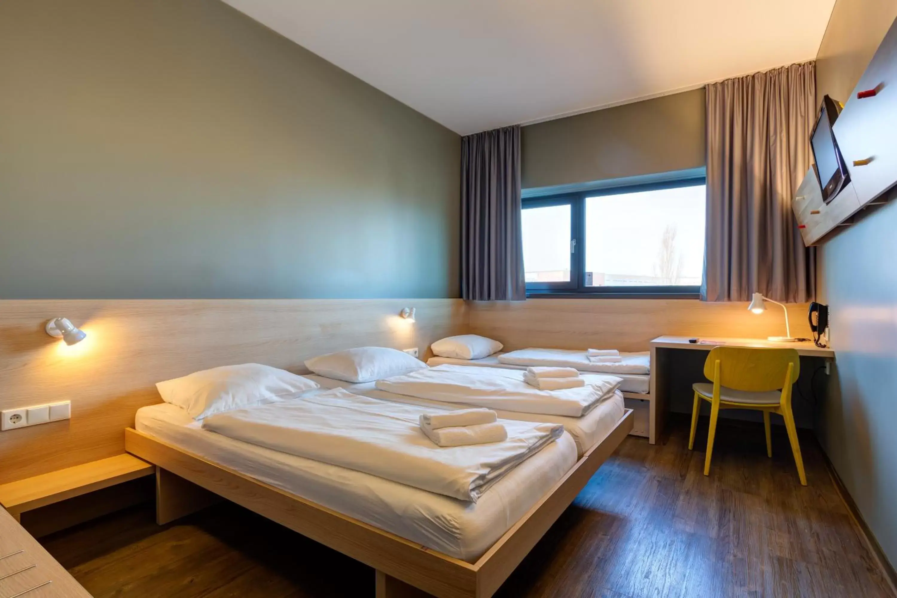 Photo of the whole room, Bed in MEININGER Hotel Berlin Airport