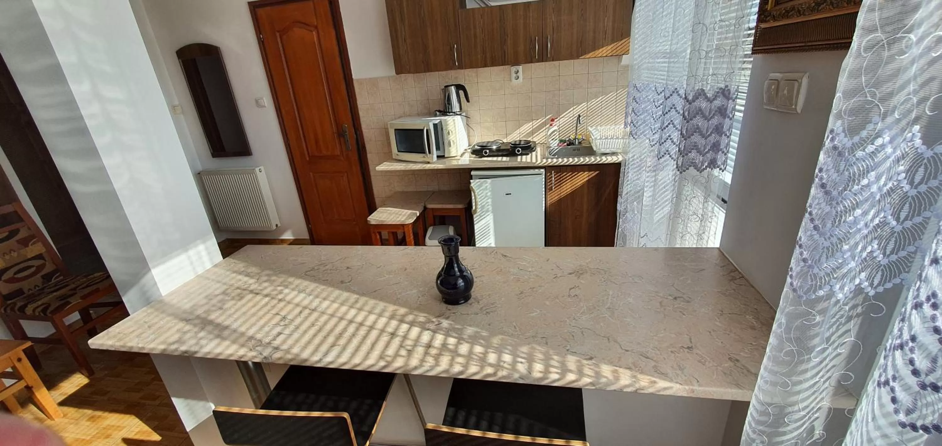 Kitchen/Kitchenette in Aqua Oazis Apartman