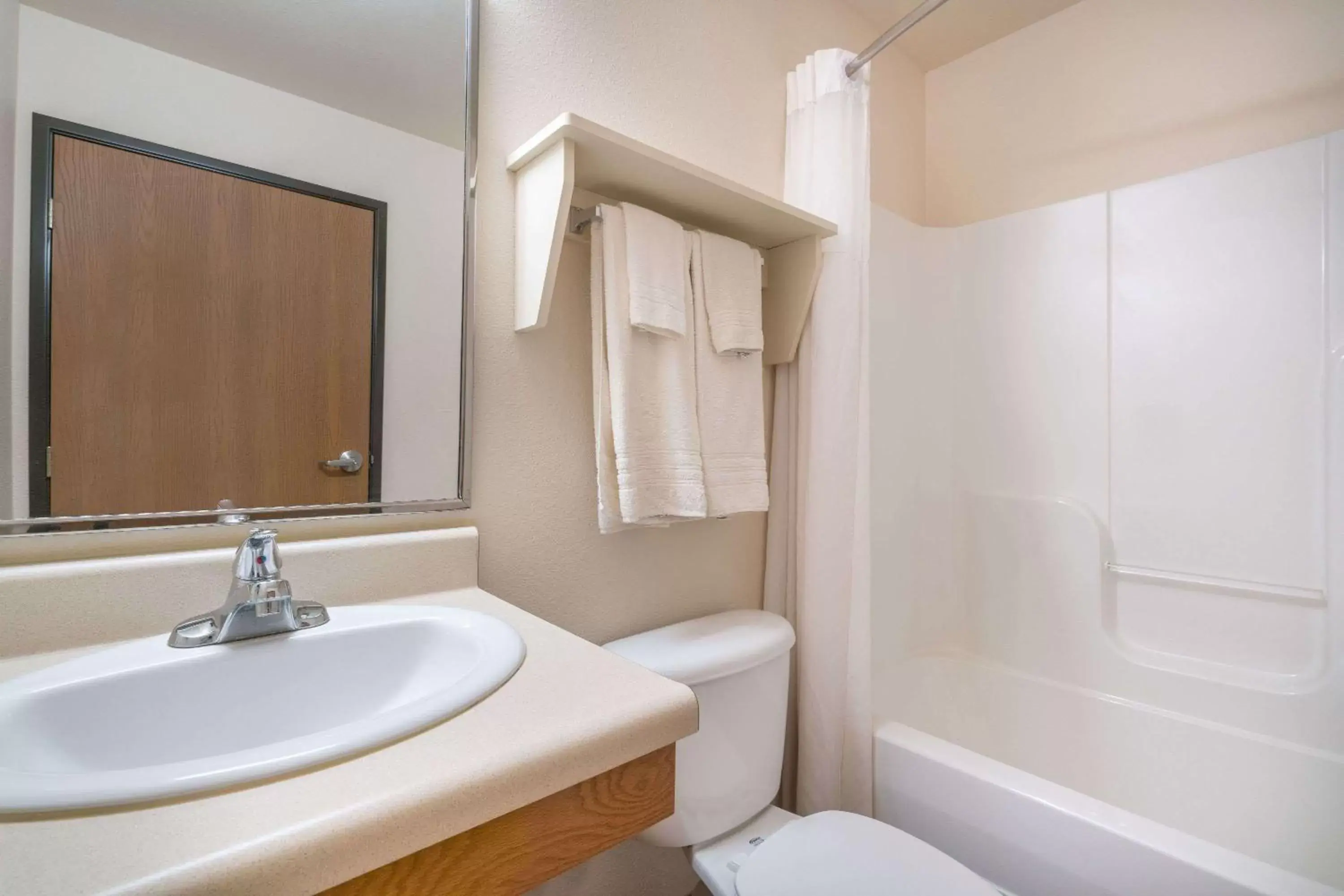 Bathroom in Days Inn & Suites by Wyndham Rochester South
