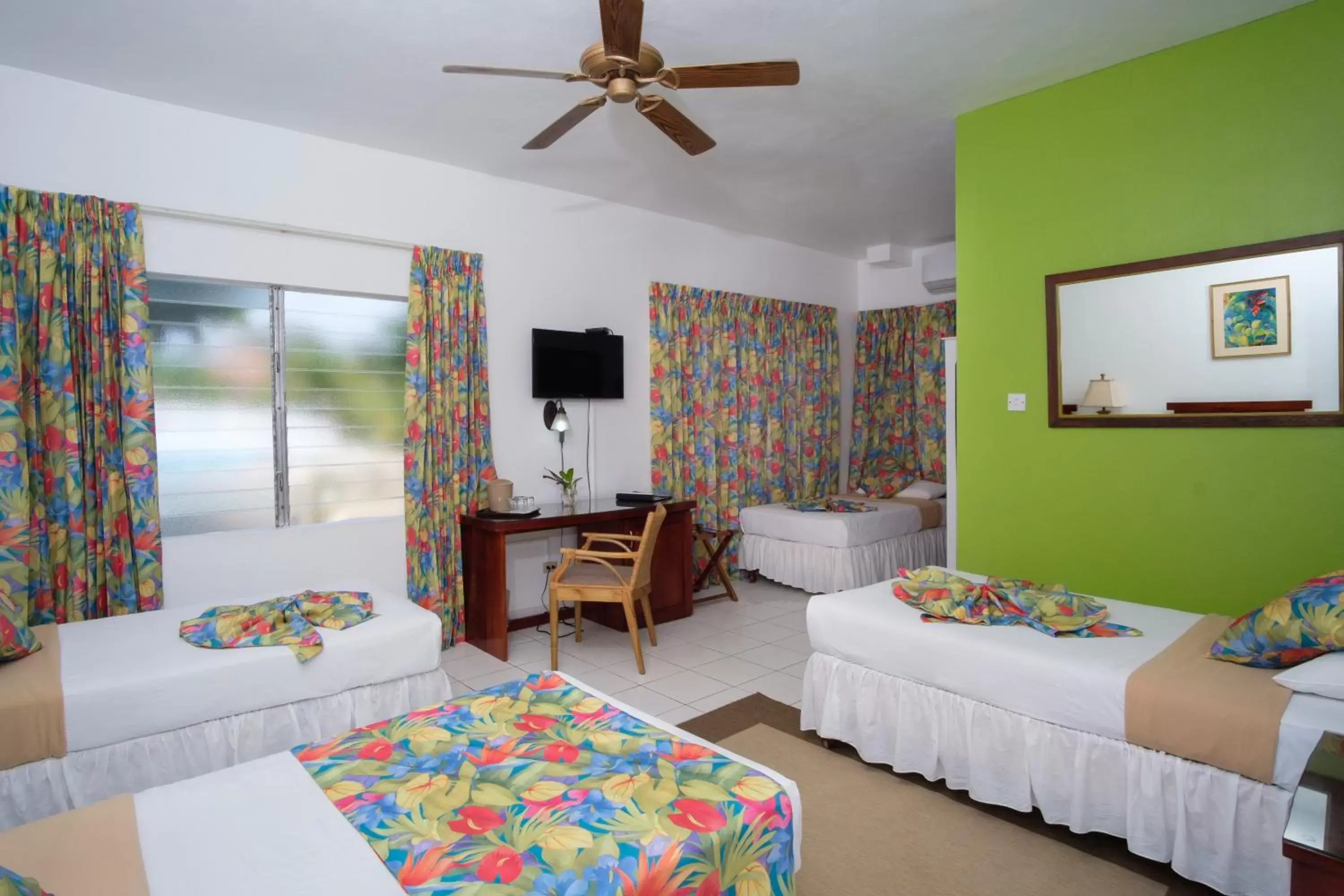 Bedroom, Bed in Hibiscus Lodge Hotel